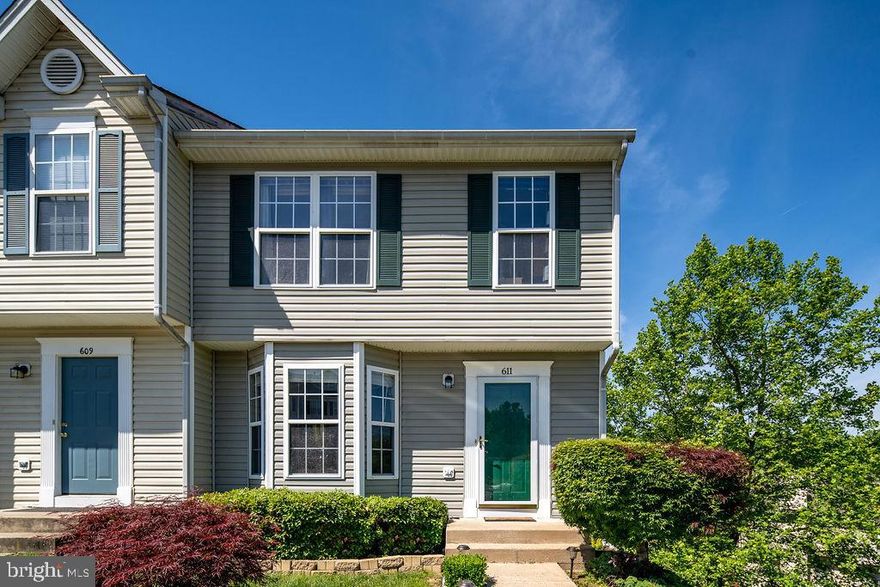 Upgraded end unit! Extremely well maintained. New hardwood floors throughout the home. Open concept kitchen that walks out onto a large deck. Upgraded bathrooms. Master bath has a soaking tub and walk-in shower. Fully finished walk-out basement has extra room for storage. Nearby lots of dining and shopping options, and Aquia Creek. Easy access to Rt 1 and I95.