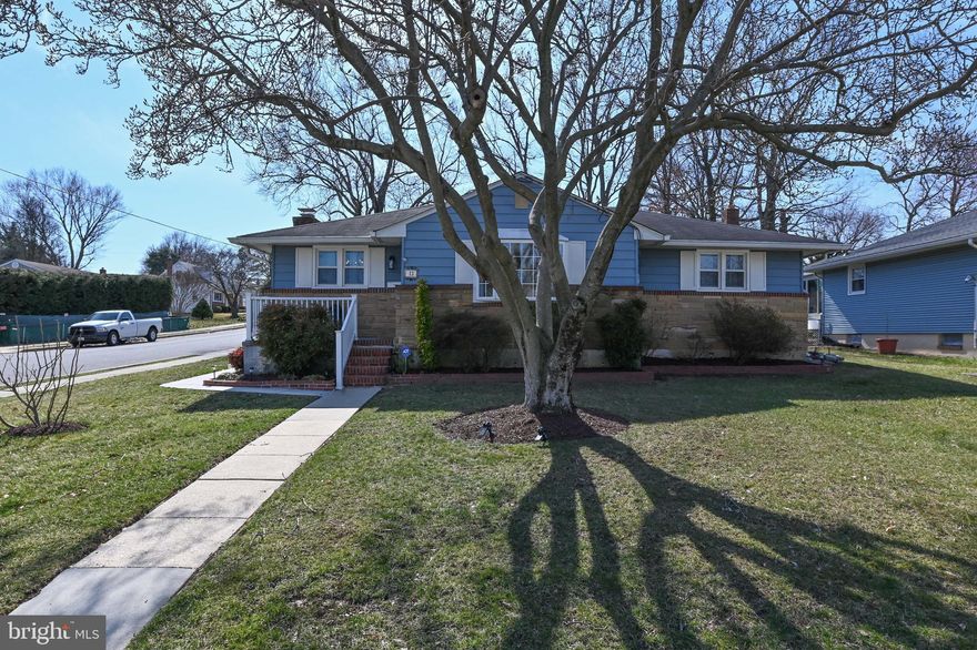 This charming home, with only one owner, is located on a corner lot and boasts a peaceful, oversized backyard. The property features a patio, perfect for outdoor entertaining, and a two-season room overlooking the lush greenery of the backyard. The main level of the house has been freshly painted and showcases newly refinished hardwood floors, providing a warm and inviting atmosphere with plenty of natural light. The open floorplan includes a bay window in the family room and an eat-in kitchen with stainless steel appliances. 

The finished basement is a cozy retreat, complete with two fireplaces and a second kitchen, along with a convenient half bath and ample storage space. The house also offers nice-sized additional bedrooms, making it ideal for families or guests. 

Conveniently located just minutes from BWI and the Marc train, this property provides an easy commute to DC, Annapolis, and Baltimore, making it a desirable option for those seeking both tranquility and accessibility.  Home is being sold AS IS.