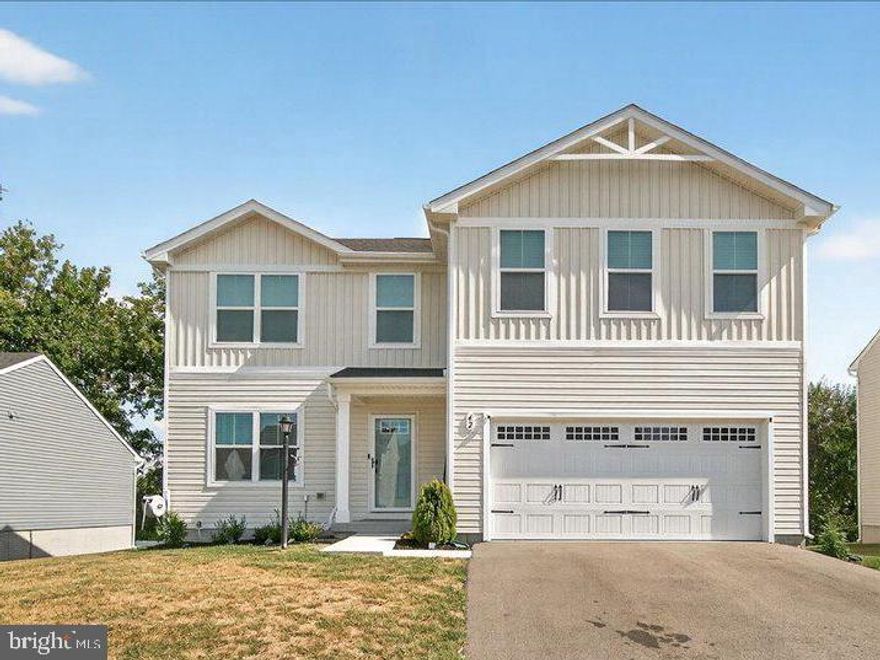 Welcome to this stunning 2-year-old home offering modern comfort, thoughtful upgrades, and an abundance of space for today’s lifestyle. With 5 bedrooms all on the upper level, this home is perfect for those seeking both functionality and convenience.

Step inside to find upgraded wide-plank LVP flooring throughout the main level, creating a warm and inviting flow. A bright and open entryway leads to a versatile dining or flex space, a convenient powder room, and a spacious living room. The gourmet kitchen boasts granite countertops, stainless steel appliances, upgraded cabinetry, and a generous kitchen table space—perfect for everyday living and entertaining. Just off the kitchen, a mudroom offers easy access to the garage where you will find an EV charger. 

Enjoy seamless indoor-outdoor living with a large deck overlooking the flat backyard and peaceful green space—an ideal setting for gatherings, play, or relaxation. The wide driveway and spacious neighborhood roads make hosting friends and family effortless.

Upstairs, you’ll find 5 bedrooms thoughtfully laid out for comfort and privacy, with plenty of room for everyone. The unfinished basement presents endless potential, already framed with an egress window for a legal 6th bedroom and plumbing rough-ins for a full bath—just waiting for your finishing touches. Custom faux wood blinds installed on all windows- which saves you a big expense!

This home truly combines modern upgrades with versatile living spaces in a desirable, family-friendly setting. Don’t miss the opportunity to make it yours!