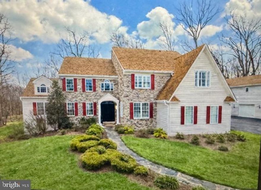 Exceptionally Private. Designed for Today’s Modern Family.

With a brand-new roof currently being installed, this exceptional estate offers a rare opportunity to own a fully renovated, move-in-ready residence on a breathtaking 1.4-acre wooded lot, where privacy, flexibility, and refined luxury converge.

Designed for growing, blended, or multi-generational living, the home features a fully renovated main level and primary suite (2023) with impeccable craftsmanship and high-end finishes throughout. A slate walkway and professional landscaping lead to the stately stone façade and covered portico. Inside, a grand two-story foyer showcases marble flooring, a crystal chandelier, and a dramatic wrought-iron staircase.

The main living spaces are ideal for both everyday living and entertaining. A separate first-floor sitting room flows into the dramatic main living room featuring soaring ceilings, a floor-to-ceiling stone fireplace, expansive windows, recessed lighting, a secondary staircase, and integrated surround sound. The chef’s kitchen is a true showpiece with white cabinetry, an oversized island, velvet-finished quartz countertops, and premium stainless-steel appliances, offering open sightlines to the dining and living areas.

Functionality is enhanced by a first-floor mudroom entry with a walk-in pantry, a private office with built-ins, and a striking two-story bonus room with triple-arched windows, ideal for a music room, art studio, or additional living space.

The primary suite is a serene retreat featuring vaulted ceilings, a stone gas fireplace, a custom dressing room, dual walk-in closets, and a spa-inspired bath with radiant heated floors, soaking tub, curbless two-person shower, double vanities, and private water closet.

Upstairs includes a private ensuite bedroom, two additional bedrooms with a Jack-and-Jill bath, and a second-floor laundry room. The finished daylight walk-out basement offers a custom bar, home gym, additional bedroom, full bath, luxury vinyl plank flooring, and ample storage—ideal for guests or extended family.

Car enthusiasts and creatives will appreciate the three-car attached garage plus a remarkable two-story detached garage addition. The first level features epoxy flooring, a car wash bay with blower and vacuum system, and climate control. The second floor offers approximately 1,200 square feet of finished, heated, and cooled space, including an office, art studio, two soundproof rooms, and a half bath—ideal for home offices, creative use, or future in-law accommodations.

Outdoor living is equally impressive with a paver patio, built-in fireplace/fire pit, and track-mounted awning, perfect for entertaining or peaceful evenings surrounded by nature.

Additional highlights include: a whole-house generator; three HVAC systems with four zoned thermostats serving the main floor, main living areas, sunroom, and primary suite; ultrasonic security system; water treatment system; irrigation with rain sensor; fenced yard; and built-in surround sound on the main and lower levels.

This is not simply a home—it is a private lifestyle estate offering elegance, comfort, flexibility, and peace of mind in a tranquil, picturesque setting.  Please note Ring recording /monitoring devices on premises.