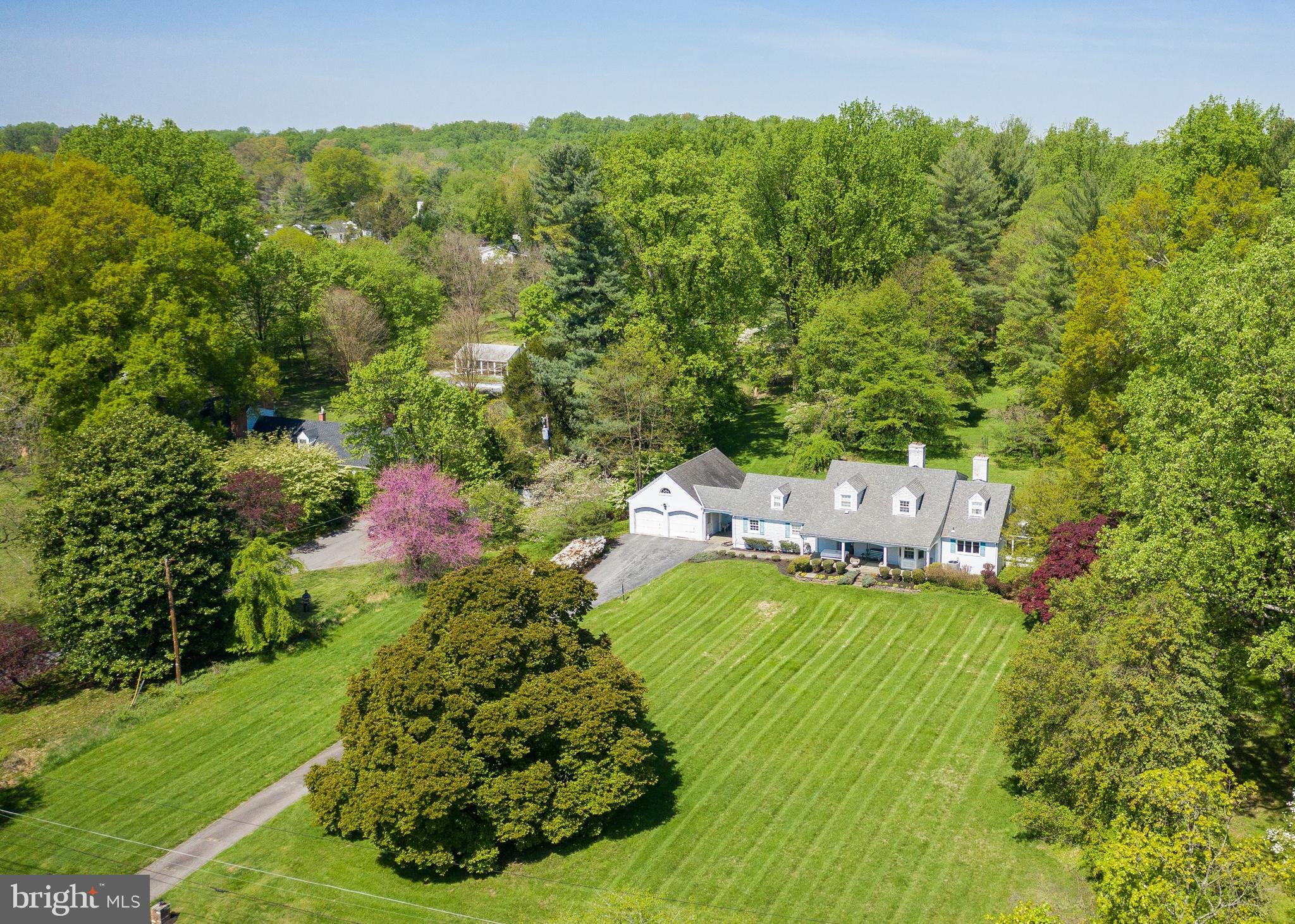 An incredible opportunity to own almost 4 estate-quality acres in the heart of the Potomac Village. The picturesque site, with wide open frontage, sprawling lawns, and mature trees, provides an idyllic, tranquil setting, perfect for a refuge from the bustle of Washington DC. The existing on the property house was built in 1957 and later was updated by the original owners. The main level of this three-story home features: large living/dining room with oversized windows overlooking gorgeous vistas of the private grounds, a spacious study, a kitchen with a breakfast nook, a sunroom, an office/bedroom, a full bath, and a mudroom. Upstairs there are four bedrooms and two full baths. Partially finished basement, two-car garage, a breezeway, and a lovely front porch complete this charming home. Coveniently located, just off the prestigious River Road, on a beautiful block with multi-million $$$ homes, this spectacular property is close to the Village center (0.6 miles), and offers an easy access to major commuting routs, three airports, the area's fine shopping, dining, schools, and wide range of museums, sports venues, and cultural centers. Truly a one-of-a-kind property, unlike anything else in this area. Exceptional and rare opportunity to renovate/expand the existing home or to build your dream estate. To fully appreciate the breathtaking beauty of this land, take a look at the AERIAL VIDEO... and imagine the possibilities...