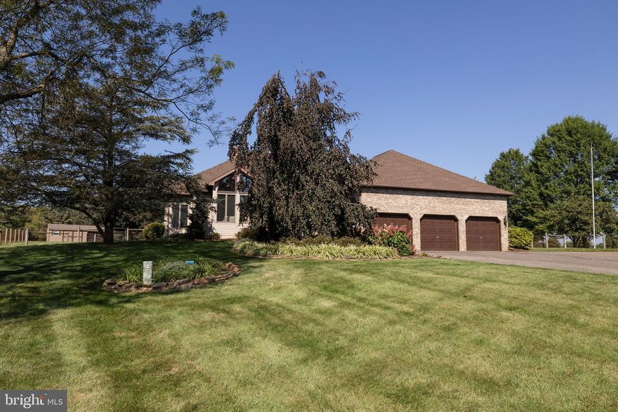 MOTIVATED SELLERS!! What a rare opportunity to own a farmette minutes away from the Fair Hill Natural Resources Management Area! The home offers, one floor living with pastoral views,glorious sunrises, sunsets, and plenty of windows providing abundant natural light. The
updated kitchen includes cabinets graced by solid cherry doors
with soft close doors and drawers, granite countertops, tile backsplash, induction
cooktop, and all Bosch stainless steel appliances. The updated four-piece ensuite
primary bath includes a 2-person air-jetted Kohler soaking tub; Kohler fixtures; porcelain
tiled floor to ceiling shower, floor, and tub surround; dual sinks; ample cherry- doored
cabinets above and below the granite countertop; and a large walk-in closet. The
second bath has updated cabinetry; a granite countertop; dual sinks; grouted flooring;
and Kohler fixtures.
Along with its 2,286 sq. ft. above-grade living space, this home has a 3-car painted and
epoxied- floored garage; full basement; floor to ceiling stone fireplace; 4 bedrooms; 2
bathrooms; first floor laundry across from the primary bedroom; and vaulted ceilings in
the living room, dining room, and great room. There is a huge, maintenance-free,
Fiberon composite deck off the back of the house measuring approximately 28’x 17’
creating the perfect outdoor space for outdoor entertaining, watching the sunset, or
playing with the pets!
This home sits on approximately 4.85 cleared and flat acres designed for grazing and
convenient access. There are two fenced pastures, a fenced backyard, and a fenced
paddock/barn area with gates between each pasture and the backyard. There is electric
and water (a hydrant plus a Bar-Bar-A automatic frost-free horse waterer) at the barn
which has 4-12’ x 12’ matted and windowed stalls and an overhang to provide abundant
shade. Floodlights on the side and back of the house provide ample light to move safely
between the house, barns, and storage sheds day and night. The small shed measures
12’ x 8’ and the hay barn measures 24’ x 12’.
The property is within minutes of Fair Hill Natural Resources Management Area with its
5600+ acres and 80 miles of multi-use trails. Fair Hill is also home to Fair Hill
International and Maryland’s Five Star Eventing at Fair Hill.
Downtown Newark and the University of Delaware are minutes away, while Baltimore
and Philadelphia are within a 1.25 hour drive.
HVAC system replaced in 2016.
Roof replaced in 2019.
Deck resurfaced as was/where was with Fiberon maintenance-free decking in 2019.
Well pump and water tank replaced in 2021.