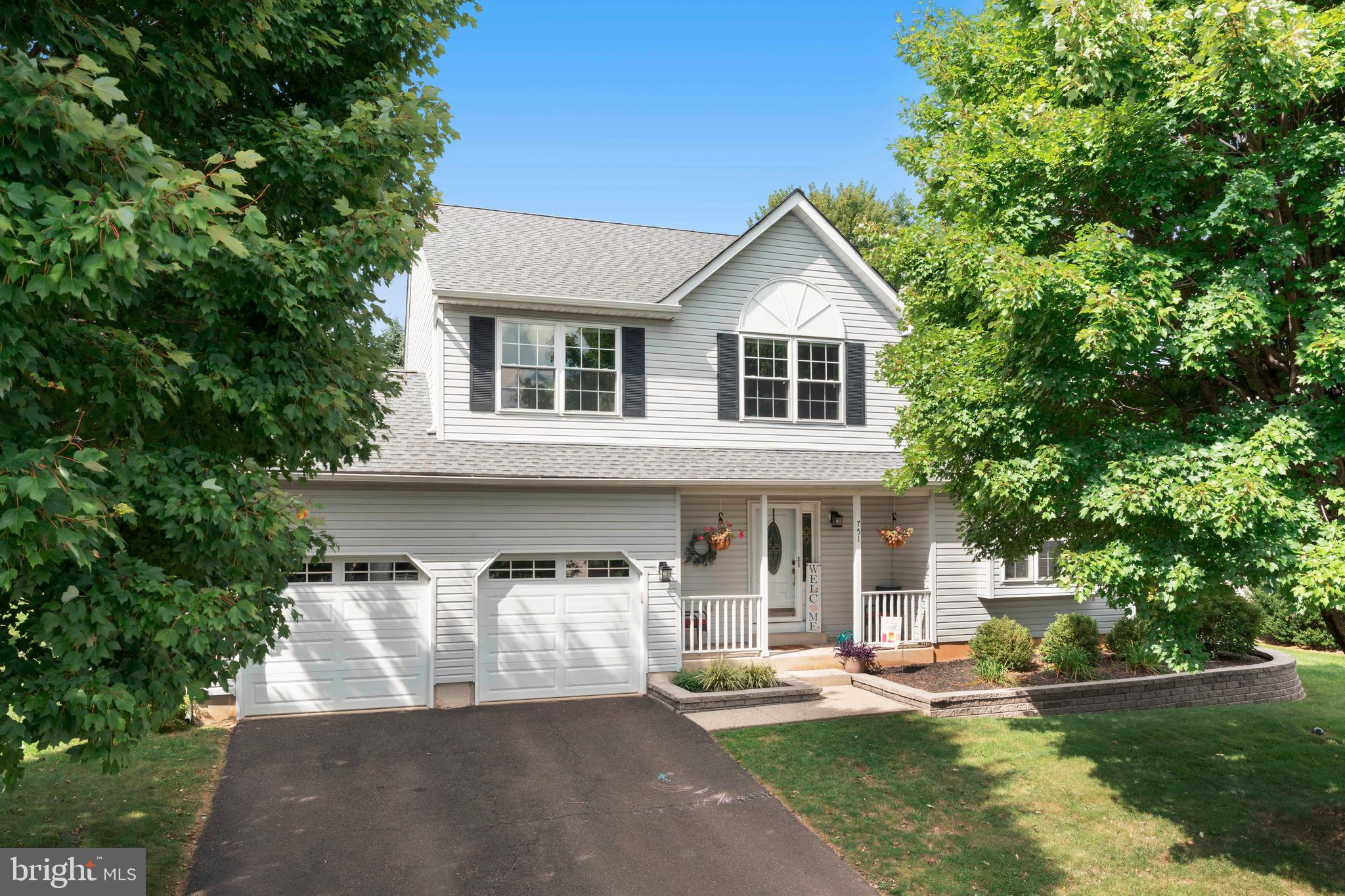 Welcome to this beautifully maintained four bedroom, two and a half bath home nestled in a desirable Langhorne neighborhood. Offering a spacious and airy layout, this home combines modern updates with timeless charm, creating the perfect blend of comfort and style.
From the moment you arrive, you will be greeted by a welcoming covered front porch, an inviting spot to enjoy your morning coffee. Step inside the foyer, where hardwood floors and a turned staircase set the tone for the home’s elegance. The living room features vaulted ceilings, filling the space with natural light, while the family room is warm and inviting with recessed lighting and a cozy fireplace.
The heart of the home is the updated eat in kitchen, showcasing hardwood floors, a center island with built in microwave and breakfast bar, stainless steel appliances including a gas stove, and a pantry for added storage. The kitchen flows seamlessly into the family room and extends out to a large covered porch, ideal for entertaining during the warmer months. Just beyond, the stamped concrete patio and fenced in backyard provide even more space for outdoor living and play.
Upstairs, the primary suite impresses with vaulted ceilings, a walk in closet, and a spa like en suite featuring a double vanity, walk in shower, and soaking tub. Two additional spacious bedrooms and a hall bathroom with tile floors and a tub and shower complete this level.
The finished basement offers versatile living space with a bedroom, a dedicated office, and a large unfinished storage area. Bilco doors provide convenient access to the yard.
Additional highlights include a newer roof, new HVAC, updated bathrooms throughout, a two car garage with interior access, and a first floor laundry room for everyday convenience.
Light filled, spacious, and move in ready, this Langhorne home is the perfect place to create lasting memories.