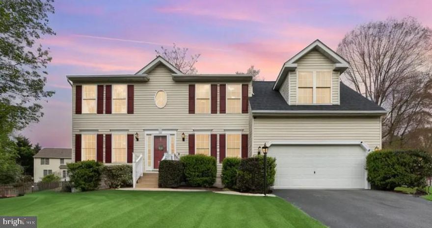 Welcome to this beautifully maintained Colonial, offering over 3,200 square feet of updated living space across three fully finished levels. Step inside to a bright and airy two-story foyer with vaulted ceilings that sets the tone for the rest of the home. You'll find a spacious 4-bedroom, 3.5-bath layout featuring updated baths and kitchen featuring new cabinetry, granite countertops, and stainless steel appliances. The kitchen opens to a sunny breakfast area with walk-out access to a large, wrap-around deck—perfect for entertaining or enjoying your private, landscaped backyard. The main level also features formal living and dining rooms, a cozy family room with a fireplace, and fresh updates throughout. Pride of ownership shines through in every detail, including a newer roof and new HVAC system. Upstairs, you’ll find four generously sized bedrooms, including a spacious primary suite with a private en-suite bath. Three additional bedrooms offer flexible space for family, guests, or a home office. The fully finished lower level expands your living options with a large recreation room, a dedicated exercise space, and a full bath—ideal for guests and hobbies. Outside, enjoy a fully fenced yard with mature landscaping and an oversized deck that creates a peaceful outdoor retreat. Nestled on a quiet cul-de-sac in a highly sought-after location, this home combines privacy and convenience—just minutes from I-95, downtown, and the VRE station. This move-in-ready gem offers the perfect blend of comfort, space, and location—don’t miss your chance to make it yours!