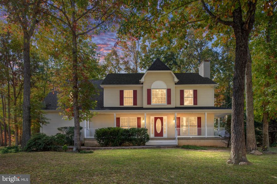 Nestled in the sought-after gated community of Lake of the Woods, this stunning colonial home offers the perfect blend of luxury and privacy. Featuring 4 spacious bedrooms and 3.5 baths, this home is designed for comfortable living. The wrap-around porch provides a charming space to relax, and the home is situated on a private corner lot in a quiet cul-de-sac. Built by Beach Homes, the gourmet kitchen is perfect for any home chef, and the large, airy rooms provide ample space for family and guests. Lots of extra closets and storage throughout.Upgrades include new Air conditioning  June 2015, Roof replaced 2019, Water Heater replaced June2019,  See the detailed floor plans in photos. Enjoy the many amenities of Lake of the Woods, including access to the lake, outdoor pool, golf club, tennis courts, jogging paths, and more. This is a rare opportunity to live in one of the area's most desirable communities. 
All guests and agents must enter through front gate of the community If using GPS sometimes it will route you to the back gate.