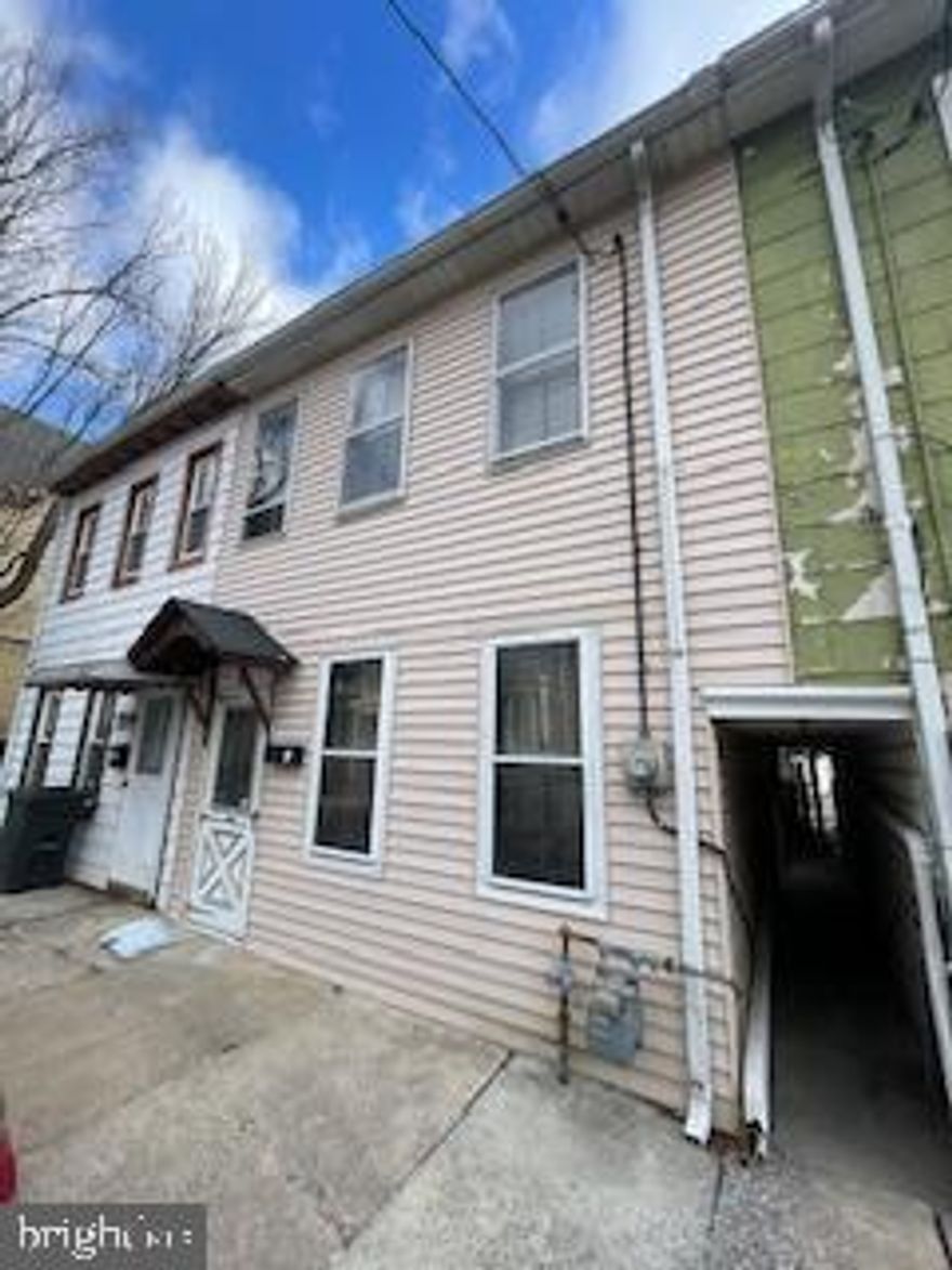 Price Reduction!!!  Attention Home Owners, Handymen, and Investors!!! Good investment Property. Check out this new listing!    This property offers a unique opportunity for the right buyer.  Living room,   dining room,  1/2 bath, kitchen, and laundry hookup on the first floor. (has new flooring on the dining room, kitchen, and 1/2 bath) Nice size backyard with Private Parking. The third bedroom is in the attic and has electric heat. This property is sold "as is" and requires renovations and updates. Set up your showing today!