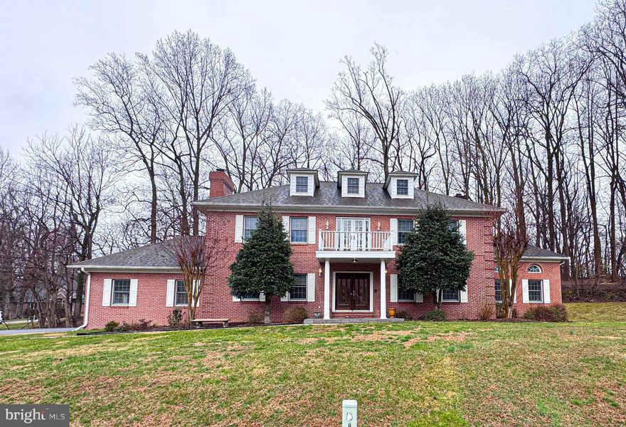Welcome to 1527 Wild Cranberry Dr., An  Impressive, Truly Gorgeous Colonial distinguished by its tall white pillars and brick exterior. 
The grand entrance with a wide staircase immediately sets the tone, showcasing stunning chandeliers, gleaming hardwood floors, and an atmosphere of sophistication that carries throughout the home. Offering over 4,000 square feet of refined living space, this exceptional residence features five bedrooms and three and a half bathrooms, thoughtfully designed for both elegance and comfort.

Step inside an expansive eat-in kitchen with ceramic flooring that flows effortlessly into the 19X14 family room. The 18X15 dining room creates a seamless space for upscale entertaining and everyday living. 
A second sunroom /study room with double French doors opens to an impressive 1,000-square-foot deck—perfect for hosting unforgettable gatherings or enjoying serene outdoor living.
(Upstairs) The 18x17  primary suite is a true retreat, featuring a custom walk-in closet, double sink, and a spacious, spa-inspired bathroom designed for relaxation and privacy.  Upstairs also offers the 2nd 11X11 bedroom and the 3rd 15X12 bedroom, which features a large closet and shared bathroom.

The fully remodeled, 2026 finished basement in-law suite elevates this home even further, complete with a striking brick wood-burning fireplace, recessed lighting, and two sets of double glass doors leading to a private patio and wooded backyard. The lower level also offers an additional bedroom, a full bathroom with a beautifully appointed marble shower, and a well-equipped laundry room with a washer and dryer. ---heat pump = 500-gallon gas heat backup
- 2-car garage, freshly painted
- 12-year-old roof