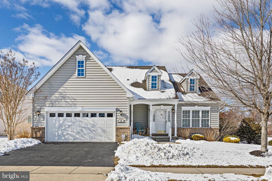 Located in the Village of Long Creek 55+ community in Newark, 18 Devalinder Dr offers over 2,400 square feet plus a finished basement designed for comfort and flexibility. Hardwood floors welcome you into an open main living space with 42-inch kitchen cabinetry featuring pull-out drawers for everyday ease. The primary suite includes a custom walk-in closet organizer, while the updated hall bathroom serves both guests and the second bedroom, which also features its own walk-in closet.

The finished lower level adds significant versatility, featuring a spacious recreation area, Bilco door access, large living room, and a dedicated bonus room suited for an exercise suite, craft room, or third bedroom. Outdoor living shines with a Trex deck and automatic awning overlooking community space, in addition to the .22-acre lot supported by an irrigation system. A two-car garage completes the package.

Enjoy low-maintenance living with HOA-covered lawn care and snow removal, plus access to the community clubhouse, library, billiards room, and organized social activities. Convenient to Route 40 shopping and dining, this home combines thoughtful design with an active, connected lifestyle.