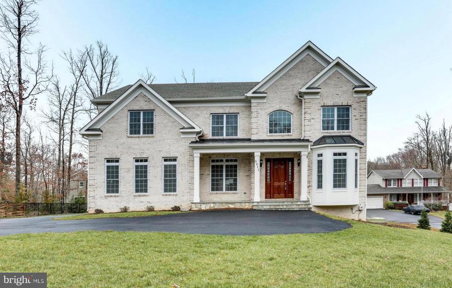 Beautiful 2016 Custom built mansion,  A true Work of Art!!!  Elaborate Moldings, Exquisite Finishes, 6 En-suite BRs, 6.5 bathrooms. Showcasing CHEF'S Kitchen to die for with Exotic Granite and Cabinetry. Huge Pantry with additional Refrigerator. Solid Hard wood floors and almost 8,000 sf of space! Desired Open Floorpan.  Main level library / Office with full bathroom. Fully finished basement with huge Rec room, Bedroom, Full bath, Wet Bar and an office / Gym. Best Location, Great Public Schools and an Amazing House.