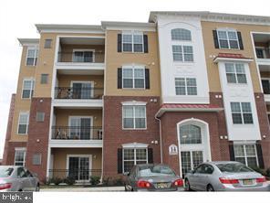 available, May 1, 2025 LUXURY CONDO on 1st floor End Unit: 4 MIN WALK FROM HAMILTON TRAIN STATION : 2 bed/2 full bath, with carpet, will be renovated to complete hardwood, once tenant leaves. All new appliances in kitchen, with Granite counter top,(refrigerator, dishwasher, microwave, gas cooking range) 42" cabinets, huge pantry washer/dryer,. Master bath with double vanity sink & ceramic tiles, 2 bath with ceramic tiles, master bedroom with spacious walk in closet. Spacious balcony. AC and heating system. Building secured with resident access and has an elevator and ample parking. Downtown/ nyc, 15 min to Princeton hospital. Major highways (Rt.1,295-I 95)4 minutes Walk from Hamilton Train station, take 295 S or N to Bordentown, exit 65B Sloan Ave, right on American Metro Blvd to Hamilton Crossing. ?Rent includes access to elegant/clubhouse with 24x7 business center, free breakfast, billiards, Movie room lounge and Gym 4 minutes Walk from Hamilton Train station,