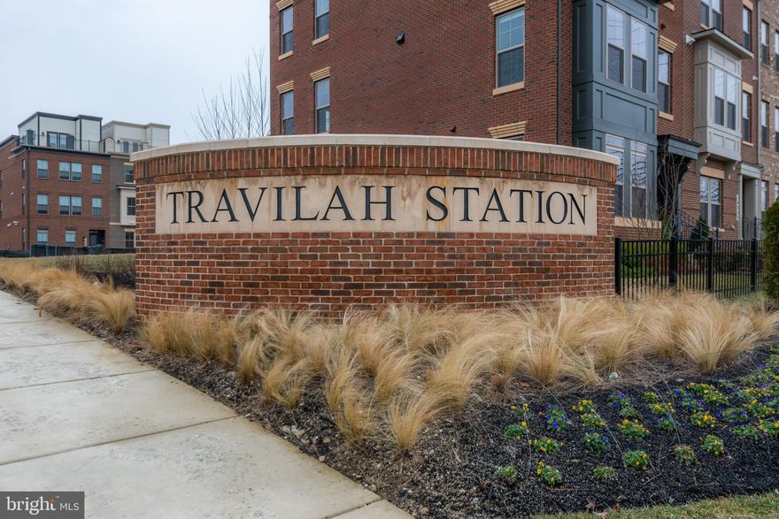 Stunning brick-front townhome in new Travilah Station Community! This home is like new featuring 3 bedrooms with 3 full and 2 half baths including a 2 car garage. Lower level entry with bedroom, walk-in closet and full bath. Bright open concept main level with beautiful hardwood flooring. Gourmet kitchen featuring stainless steel appliances and huge island. Kitchen overlooks the large living area with cozy gas fireplace and custom built-ins. Formal dining room off the kitchen perfect for entertaining. Upper level features master bedroom with walk-in closet and ensuite bath with double sinks and tile shower. Second bedroom features another large ensuite with soaker tub. Top level is multipurpose and could be additional bedroom or living space. Walkout to rooftop terrace with stunning views! Minutes to I270, ICC and all major commuter routes.