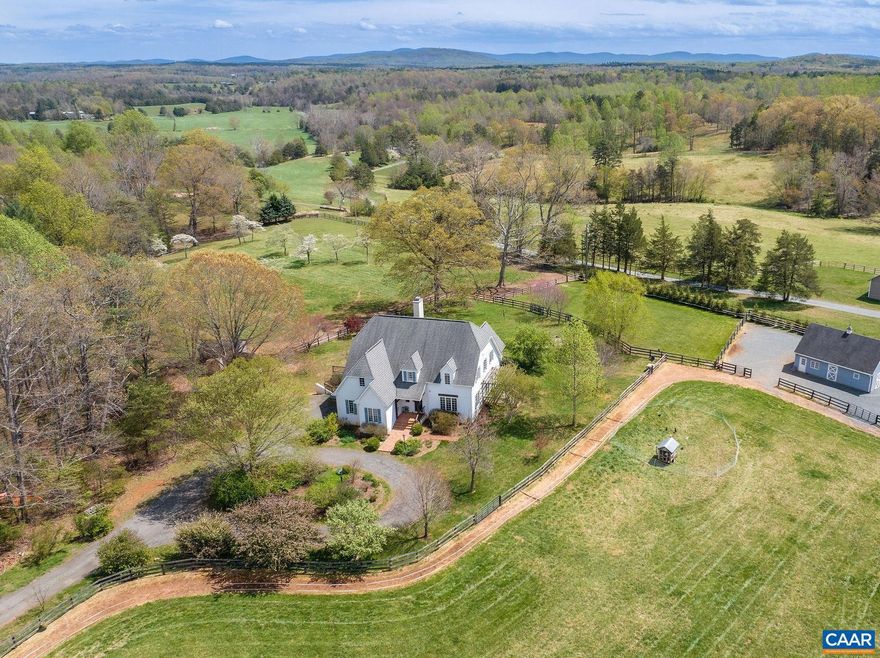 Nestled in the heart of Farmington Hunt country, this well-maintained horse farm spans 15 acres, w/ 3-stall barn expandable to 5 stalls, paddocks, special care dry lot track, automatic waterer, and five-acre flat hay field/schooling area. Located just minutes from fox hunting fixtures, the farm provides easy access to a vibrant equestrian community and the area?s rich traditions. Set amidst perennial gardens and mature trees, the 4-bedroom, 3.5-bathroom house envelops you in a warm ambiance, where every corner feels inviting, and every window frames a storybook view. The soaring ceilings in the great room uplift the spirit and open living spaces allow for a gentle flow from the foyer to the great room, kitchen, and sun room. The kitchen is both stylish and functional, featuring custom no-VOC maple cabinetry and large island. Just off the kitchen, the sun room has direct access to the patio surrounded by perennial gardens and the peaceful sight of horses grazing nearby. The formal dining room opens to a deck and connects to the LR through pocket doors. This is an exceptional offering in Albemarle County. Don't miss the informative brochure in the media link.,Maple Cabinets,Soapstone Counter,Fireplace in Great Room