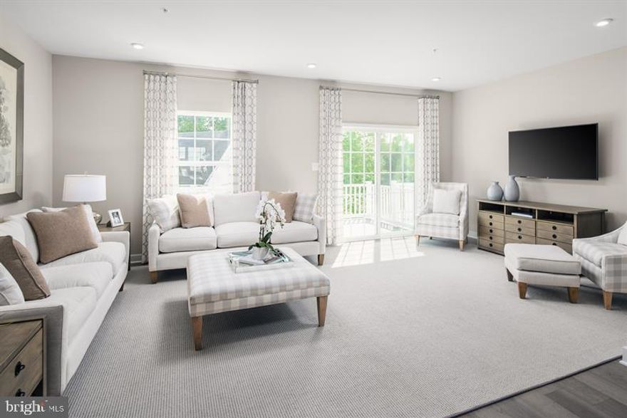 THIS FEBUARY DELIVERY HOME WILL INCLUDE : Upgraded Elevation E, Sonoma Cherry Slate Cabinets, Hardwood Stairs w/ Metal Balusters .Monroe Designer Interior Package, Quartz Iced White Countertops, Stainless Appliances with Gas Cooking, LVP Flooring on the Main Level, Ceramic Bathrooms, Ceramic Laundry Room, 3-Piece Plumbing Rough-In, 18'x8' Composite Deck, Additional Lighting, Smart
Thermostat, Wifi Garage Door Opener, Tankless Hot Water Heater The Schubert, at the largest of the Composer II series homes, offers the space and customizing details of single-family living with the convenience of a townhome. On the main living level, you're greeted by an enormous and airy kitchen with a huge island perfect for entertaining. The dining room provides space for a more formal meal while the great room is perfect for movie night evenings at home. Up a flight of stairs designed to be elegant and functional, the upper level boasts three bedrooms, two baths, and a full sized 2nd floor laundry with extra shelf space and an optional laundry tub. No need to worry about storage space Ã generous closets abound in both bedrooms. The Primary's Bedroom is a private retreat accented with an optional tray ceiling and featuring an enormous walk-in closet. The Primary's Bath boasts a soaking tub and separate shower with seat and a dual vanity for the ultimate in convenience. Several lower level floor plans are available depending on community. Photos are Representative. Lot Premiums may apply.