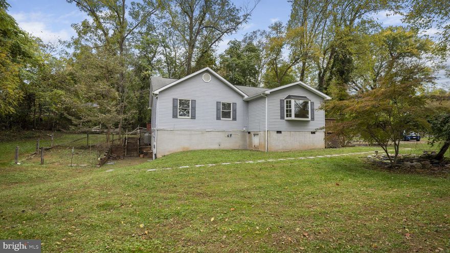 Updated 3 Bed, 3 Bath Rancher in town on private, secluded lot, close to commuter routes.  Fresh Paint, New Luxury Vinyl Plank in bedrooms.  Ceramic Tile in Kitchen, Updated Appliances.  Separate Kitchen/Living Space in Lower Level.