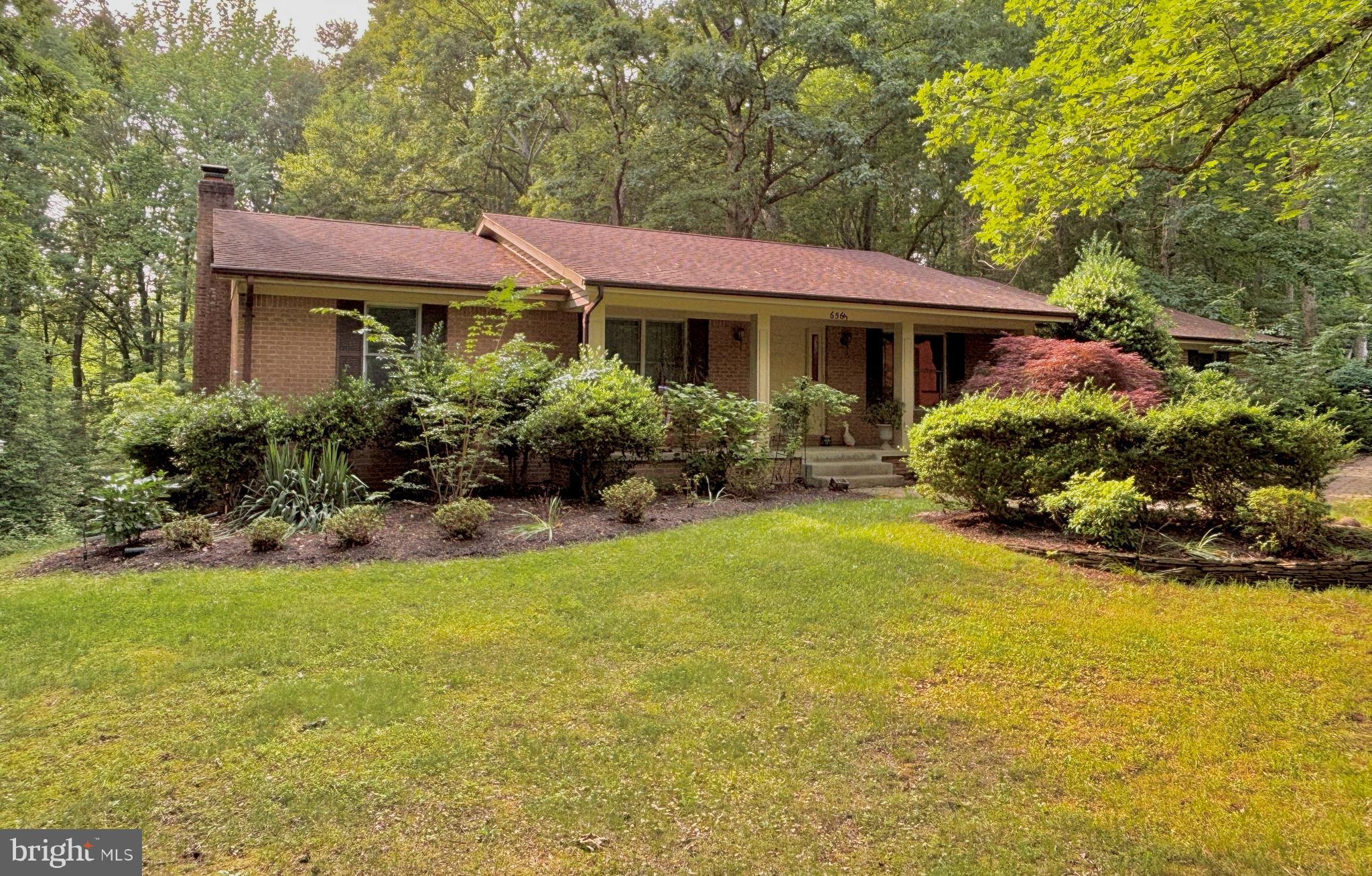 Charming Brick Rambler on 3.75 Acres, a Nature Lover’s Retreat! Nestled on 3.75 beautifully wooded acres, this spacious brick rambler offers over 3,600 square feet of total living space and a serene setting ideal for those seeking peace and privacy. Inside, you'll find 4 bedrooms and 3 full bathrooms (one of which in the basement), including a secluded primary suite thoughtfully separated from the remaining bedrooms for added privacy. The main level offers true one-level living, highlighted by a welcoming family room with access to the multi-tier deck with patio underneath, a formal living room that transition to the dining room, and back around into the kitchen that has ample counter space and room for an eat-in table/chairs. The full, partially finished basement features a cozy fireplace, built-in bar, and room to finish additional living or entertainment spaces to suit your needs. Additional features include a 2-car attached garage with a bonus storage room, 1-car detached garage, large shed, and plenty of driveway space for extra vehicles. Recent upgrades include a roof that’s less than 4 years old, offering peace of mind for years to come. Don’t miss the opportunity to own this rare combination of privacy, space, and comfort—just waiting for your personal touch! No town taxes, no excise school tax, no HOA!
