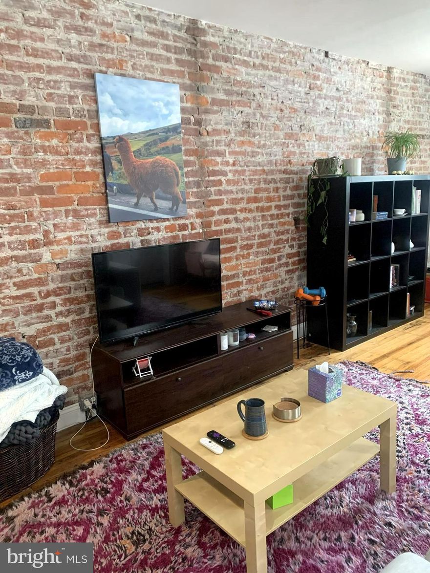 Beautifully crafted three bedroom home in terrific Brewerytown neighborhood, bright and charming with original details. Inlaid hardwood floors throughout. First floor kitchen, living area and powder room.  Exposed brick walls in living areas. Upstairs two bright bedrooms and a beautiful bathroom with large shower. Nice front porch overlooking tree, lined street. Easy walk to restaurants, cafes, shopping, art museum, Fairmount Park and Kelly Drive. The basement portion has an additional bedroom, full bathroom and heated garage. This is a no smoking property. No cats, please. Dogs allowed with references and a separate pet fee ($250-$500, depending on references). One of the current tenants is interested in staying for another year and is looking for 2 new room mates. The ideal candidate will have a minimum credit score of 650, prior landlord references and decent income. The home is also available to anyone who wants to live there and the current tenant will move-out, if room mates are not found. Available early August 2024.