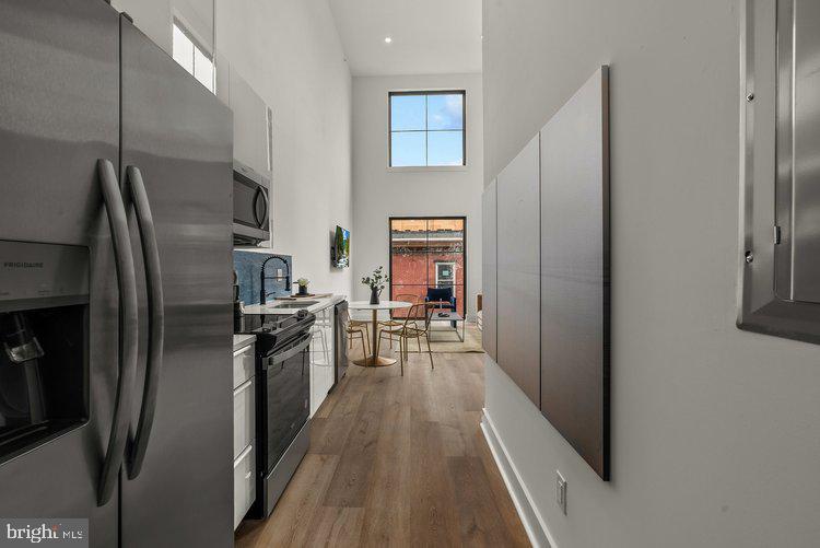 * ALL UTILITIES AND INTERNET INCLUDED FOR THE FIRST YEAR
Introducing The Tarry, an exclusive collection of seven apartments exuding boutique excellence. Sunlight cascades through expansive casement windows illuminating each of these impeccably appointed units. Immerse yourself in the sleekness of quartz-adorned kitchens and indulge in the sophistication of bespoke Italian-tiled baths. All units are tastefully furnished and ready for you to call home! Discover Unit 6: a two bed, two bath bi-level apartment with two story living room and outdoor space, where an abundance of natural light pours through floor-to-ceiling windows. This unit features two large spacious full baths, full sized gourmet kitchen, and large entertaining space. This unit also includes a private full-sized washer and dryer. The Tarry is located right on the boarder on Northern Liberties and Fishtown, offering the best restaurants, shopping and entertainment venues of both booming neighborhoods, as well as quick access to the city’s public transportation and I95.