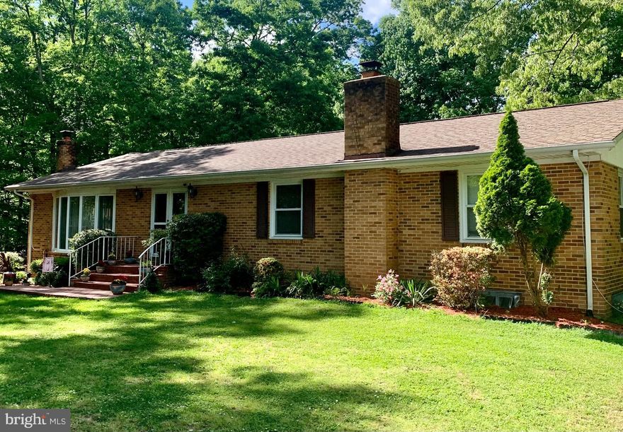 REVIEWING OFFERS - WILL TAKE BACKUP OFFERS! Over 2700 sq. ft. of finished space in this all brick rambler! Situated on almost an acre of fenced in land, this 2 level rambler has an in-ground heated pool, 2 decks, sunroom and so much more. The living room has a large bay window which makes this room very bright and inviting. The sliding glass doors in the dining room lead out to one of the 2 decks on the house and there is an additional window in the dining room that does not show up in the pictures. The open kitchen has plenty of room for a table with an open wall looking into the living room. Once you walk down to the basement, you will be greeted by a large family room with a wood burning fireplace and a dedicated bar. The basement has plenty of storage along with a full bathroom and bedroom. The basement sliding glass doors lead out to a large sunroom  with a door to the backyard and pool. Plan to see this today!
