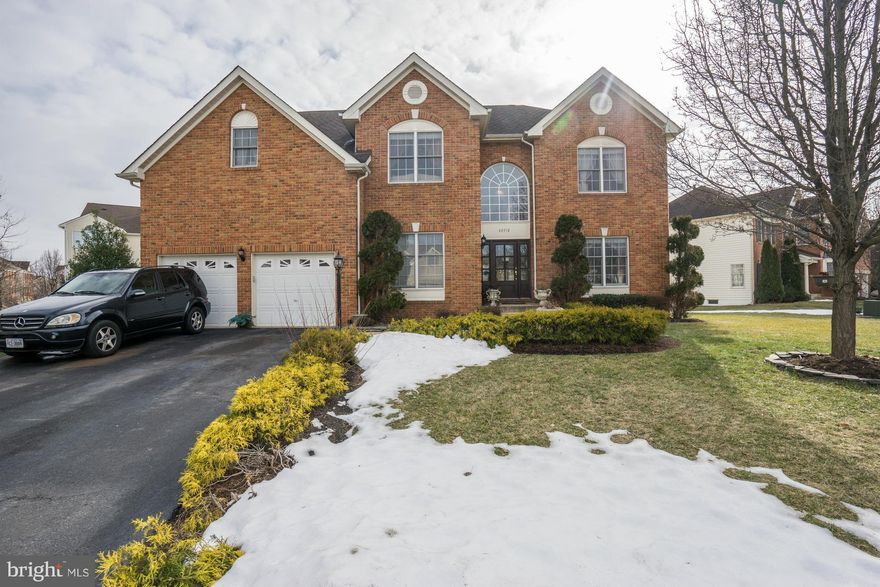 Stunning 5 bedroom home, over 4400 sq feet.  Main floor has stunning light filled family room, office with french doors, gourmet kitchen and large formal rooms.  2nd floor has large master with sitting room and guest suite.  Amazing lower level: custom bar, huge rec room, theater room, bedroom, full bath. Located on 1/3 acre, cozy cul de sac lot. South Riding amenities.