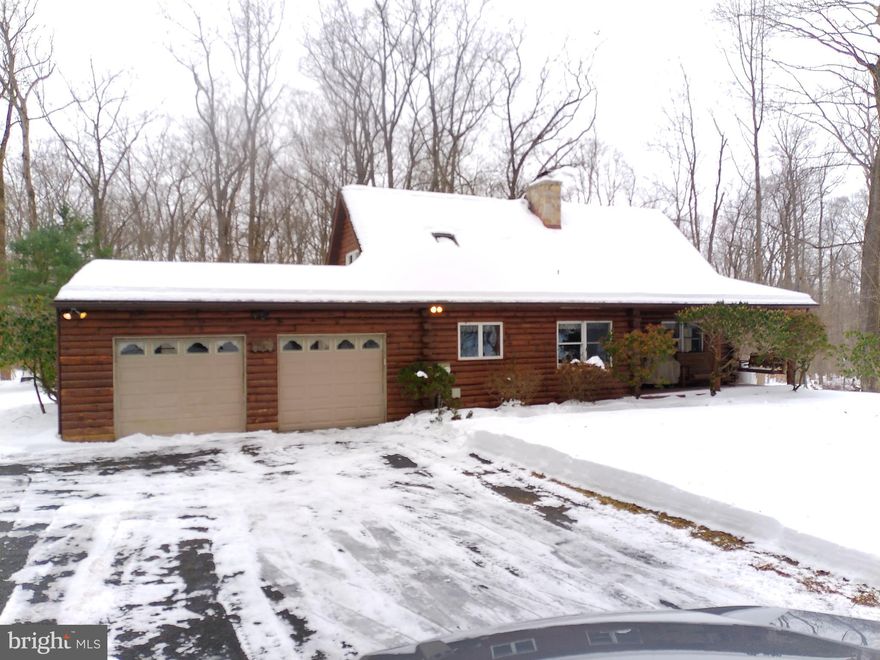 Charming log home set on approximately 2 acres of wooded land in East Rockhill Township, Bucks County, PA. Features include a front porch, rear deck, sunroom, and a paved shared entry driveway. Inside, you’ll find two bedrooms, two full bathrooms, a propane fireplace, and a full unfinished basement. The property also has a two-car attached garage, private water, and sewer. Sold as-is, estate sale.