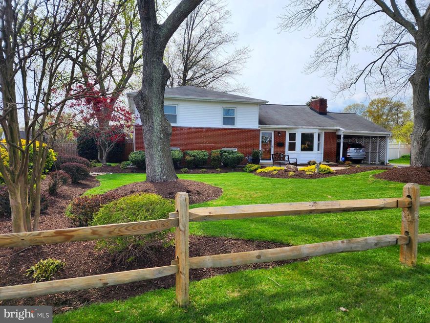 Stunning, private, park like, level yard!   Definitely a  Zen moment! Lush grass, a calming waterfall & pond, plenty of room for play, pets,  or just relaxing In this privacy fenced rear yard.  The yard  is considered a double lot and has  almost 19,000 sq feet.   The front yard  looks across the street to a Fairfax County park!  Minutes to DC, Old Town, Ft. Belvoir, and all transportation/airport.  
 Many updates:   Thompson Creek Energy Windows with a lifetime warranty, Gutter Leaf Filter Lifetime protection, gas lines replaced inside the  home in 2013,  and  outside gas line and meter was done last year,  gas hot water heater replaced in 2020,  gas heat and central air replaced in 2013,  2011 Roof Replaced with 25 year Warranty, in 1999 the 792 sq ft garage with high ceilings/attic with pull down stairs, heat, in  1996  the 10x18 shed was custom built, 2023 special Ultravation Indoor Air Quality unit was added to the furnace,  main bath was professionally remodeled in  2015,  privacy fence added in 2021, pond was installed by Knee Deep Ponds, Inc in 2015, in 2020 a Sentricon  system for termites was installed,  along with   a  quarterly  maintenance  program for all pests with Moxie.  Most of these improvements have long term warranties that can be transferred to new owner.
Hardwood floors  in bedrooms, living room, steps, and hallway upstairs, luxury vinyl tile in kitchen and dining room, Plantation shutters in living room, custom wood blinds in dining room, and all window treatments convey.
1950's  bar area in a Recreation Room area with a  bar stool section and a pass through to the rec room.    Yes, an original Lava lamp on the shelf!  In the lower area, as well, there is a laundry & storage area with laundry tub, washer/dryer, and lots of storage, and a half bath.
This is a 3 level split home, with the lower level, not basement, is on a slab and finished, the main level has a crawlspace under it's area, and upper level has an attic that is floored.  Three exits on the main level, one exit on the lower level, all with storm doors.
The home has carport parking, driveway parking, storage area for a boat or camper, and in a  secure, fenced rear parking area+792 sq foot garage with heat, the a/c unit in window is  "as is", high ceilings, and pull down attic stairs with storage.   The garage was built for a car buff!  There is a potting shed behind the carport and plenty of garden space too!
No HOA, FIOS for internet, Cox cable,  trash pickup is once a week, and the fee is a part of your local taxes.
Please come to the open houses on Saturday and Sunday to see this one of a kind home.  12 to 5 on April 20th and 21st.  Words cannot describe this special home!