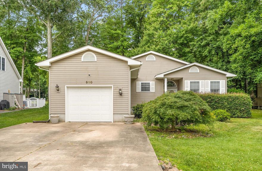 This is the one you've been waiting for! Located on a prime golf-course lot, this single-story home offers all of the modern desirable features. Step inside to find flowing luxury vinyl plank flooring in a drift wood finish, an open concept floor plan, a spacious family room with a stone fireplace and shiplap wall accent, and a beautifully remodeled craftsman-style kitchen with custom white cabinetry, granite counter tops, stainless steel appliances, and tile backsplash. The split floor plan hosts the master suite on one side with a walk-in closet and an en-suite master bath, and the two spacious guest bedrooms and a full bath on the other side. Relax in the sunroom overlooking the back yard and golf course, or catch some sun on the extended back deck. The concrete patio is perfect for grilling and hosting outdoor get-togethers. The back yard is a fantastic size and well kept, maximizing views of the golf course. This home has had many impressive upgrades recently, to include an encapsulated crawlspace with two fans, new gas fireplace, new gutters and downspouts, new roof within the past 5 years, a tankless water heater, new windows in the living room, new sliding glass door in the guest bedroom, new washing machine, and custom cabinetry in the garage. Ocean Pines is a fantastic community boasting a grand amenities package, with indoor and outdoor pools, a beach club in Ocean City, marinas with boat slips available for rent or purchase, a golf course, sports courts, a dog park, walking trails, playgrounds, farmer's markets, and so much more.