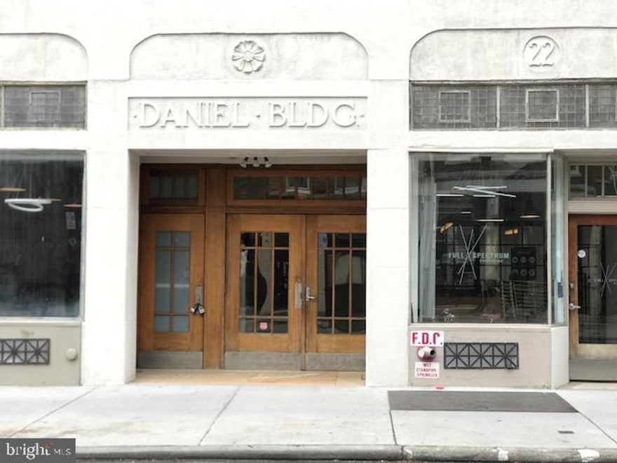 NYC-Style Loft in Old City Philadelphia
Urban Industrial Living Meets Historic Charm
Imagine stepping into a spacious, open-plan loft nestled within the heart of Old City, Philadelphia—offering the New York City vibe yet infused with the rich history and vibrant culture of Philadelphia’s oldest neighborhood.
Architectural Features:
The loft is situated in the repurposed, Historic Daniels Building, a former factory then Business Offices.  The building reflects its industrial origins. Exposed brick walls, original to the 19th-century construction, set a  textured backdrop. Soaring ceilings—10 feet or higher—creating an airy atmosphere, complemented by oversized new industrial windows facing East, West & North that flood the interior with natural light and provide sweeping views of cobblestone streets and historic facades below.
Polished concrete floors stretch throughout the space, seamlessly connecting living, dining, and kitchen areas in a single, expansive room. Structural columns, visible ductwork, and steel beams are left exposed, showcasing the building's industrial bones and adding to the authentic loft aesthetic.
Layout and Design:
Living in a New York City-style loft embraces an open floor plan with minimal interior walls. The kitchen is modern and sleek with stainless steel appliances, featuring a large prep table for entertaining. The   Bedroom areas are separated by  translucent partitions  —maintaining both privacy and openness. The full Bathrooms are industrial contemporary,  one with a smaller walk-in shower and the other a Tub Shower.. 
The Neighborhood :
Stepping outside, Old City offers a blend of galleries, boutique shops, cafes, and iconic sites like Elfreth’s Alley and the Betsy Ross House. Living in this loft means being within walking distance to vibrant nightlife, top restaurants, and easy access to public transportation—much like the Tribeca or SoHo experience, but with Philadelphia’s unique flair.
In summary, This New York City-type loft in Old City Philadelphia combines industrial vibe with historical character, providing a versatile space for modern urban Dwellers.
Monthly Parking is available in nearby parking lots.