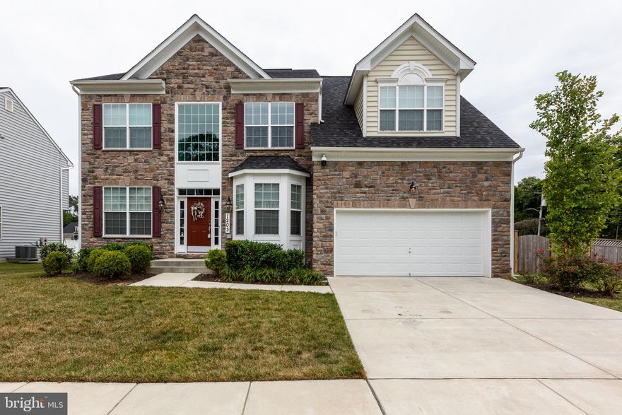 Come see this beautiful, like new, colonial on a large corner lot. This immaculate home is the perfect combination of traditional living with a modern twist.  Hardwood floors throughout the main level, an impressive kitchen island, and gorgeous a bump out that's flooded with natural light are just a few features.  The owner's suite features an oversized walk in closet and custom en suite bathroom.  The backyard oasis is the largest in the community with a custom patio and built in fire pit.