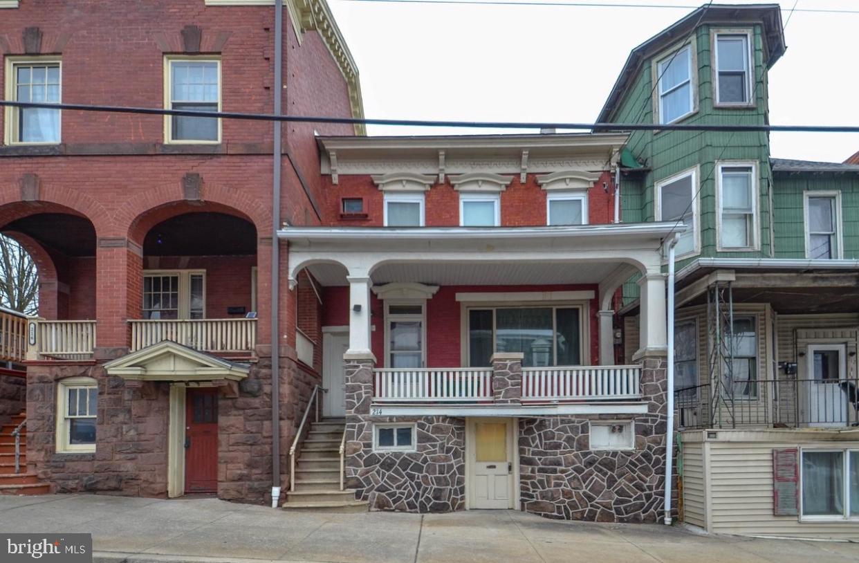 Investors and Home Buyers, Discover This Rare Opportunity to Own a 3-Unit Property in Schuylkill Haven Borough. Consider Occupying One Unit and Leasing the Others to Create a Passive Income Stream. This Singular Property Comprises Two Separate Properties: 214 E Main St, a Spacious 2048 Sq Ft Residence Featuring 3 Generous Bedrooms, 1.5 Baths, a First-Floor Living Room, Dining Room, and Eat-In Kitchen. The Second Floor Boasts 3 Expansive Bedrooms, Multiple Closets, and a Full Bath. This Unit Also Includes a Basement with a Newer Furnace and Laundry Hookups. The Backyard Offers a Cement Patio and Access to the Adjacent Property. 223 E Wilson Features a 1st-Floor Unit with Carpeting Throughout, a Living Room Leading to a Dining Room Area, an Open Kitchen, 2 Bedrooms, and a Full Bath with a Laundry Area. The 2nd Floor Hosts a Living Room, Kitchen with Dining Area, 2 Bedrooms, and a Full Bath with Laundry Area.