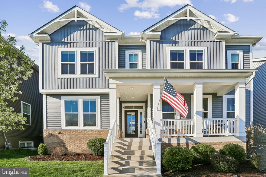 Welcome to this stunning 5-bedroom, 3.5-bath Colonial/Craftsman home in the highly desirable Tuscarora Creek community, offering over 3,200 sq. ft. of beautifully customized living space. Built in 2020 and enhanced with thoughtful upgrades throughout, this home blends modern comfort with timeless design.
The main level features a bright, open layout anchored by a spacious family room and a gourmet kitchen with a large center island, white cabinetry, and abundant counter space. Just off the foyer, a private first‑floor office showcases floor‑to‑ceiling built‑in bookcases, creating an ideal workspace or library.
Custom windows—including larger profile windows and select transoms—flood the home with natural light, highlighting the detailed moldings and trim work that elevate every room. The family room includes a custom bar, perfect for entertaining. Upstairs, the primary suite is a true retreat with a tray ceiling, a walk‑in closet outfitted with high‑end built‑ins, and a luxury bath featuring a soaking tub and separate glass shower. A bright and open second‑level family room/loft adds flexible living space, ideal for relaxation or play. The large bedroom‑level laundry room offers exceptional convenience with custom cabinetry and countertop workspace. The fully finished lower level provides a fifth bedroom, full bath, and additional living area—ideal for guests, multigenerational living, or a private studio.
Outside, enjoy a covered front porch, a white vinyl picket‑fenced backyard, and a 2‑car garage with additional driveway parking. Located in a vibrant, amenity‑rich community offering a pool, clubhouse, and walking paths, this home provides the perfect blend of comfort, style, and convenience—just minutes from shopping, dining, and commuter routes.