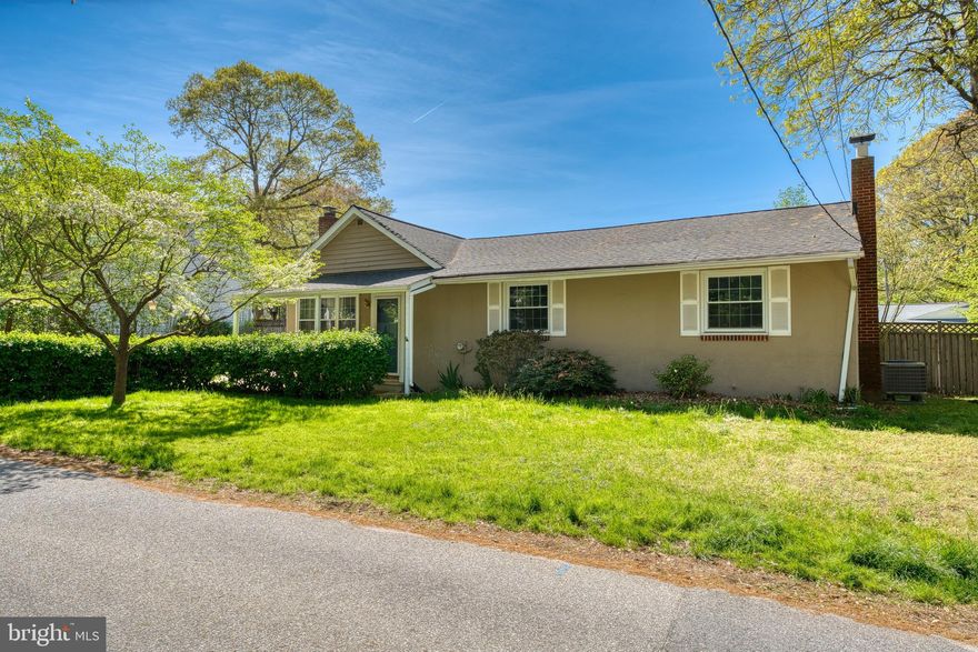 Welcome to 602 Knollwood Rd, a well-loved 3-bedroom, 1.5-bath home nestled in the desirable water-privileged community of Carrollton Manor in Severna Park. Sold as is, this charming property sits on a rare double lot and offers space, character, and endless potential. Step inside to a bright and cozy living room with high vaulted ceilings and a welcoming fireplace. The kitchen features stainless steel appliances and opens to the main living area. All three bedrooms and the full bath are conveniently located on the main level. You'll also find designated staircase leading to the attic, providing additional storage or future expansion possibilities. Downstairs, the spacious basement offers flexibility to create a rec room, home gym, office, or whatever fits your lifestyle. Out back, enjoy a new deck—perfect for summer gatherings—and a large shed for additional storage. The oversized driveway can easily accommodate multiple vehicles, including your boat, jet ski, or other water gear—ideal for living in a community with water access. As part of Carrollton Manor, you’ll enjoy access to a clubhouse, private beaches like Sunset Beach, Crabaway Pier, and Hillbottom Beach, plus kayaking and picnic areas. You're also close to Anne Arundel County favorites like Sign Island and Tree Island. Surrounded by excellent schools, this location is perfect for those looking to enjoy everything this vibrant community has to offer. Don’t miss the opportunity to own a slice of Severna Park with incredible water privileges—ready for your personal touch!