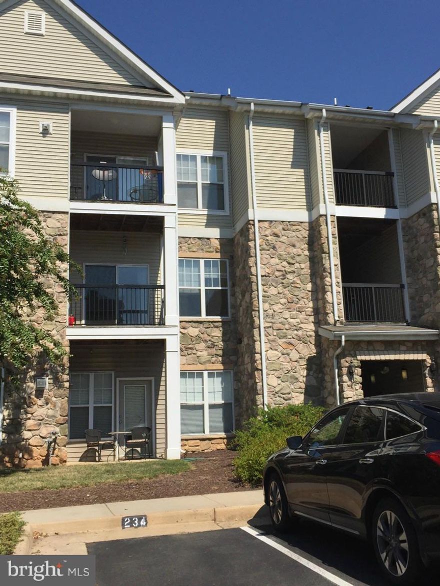 Bight, spacious, freshly painted and ready to move in 3 bedroom  / 2 bathroom condo at Stonegate at Faircrest;.  This gated community is close to 66, 28, 29, and shopping.  Balcony is off of living room.  Wood laminate flooring in main living area.  The condo has a fitness center and pool.  Close to Fair Lakes.