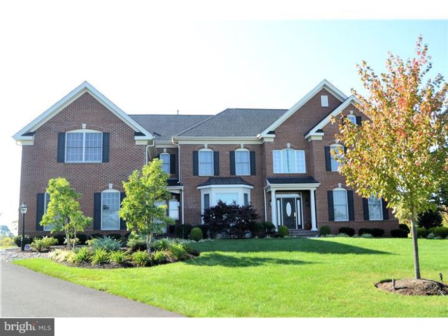 Foxhall Estates is a small enclave of  18 estate homes in Council Rock School District located in desirable Newtown. This stunning home is located on a cul de sac and is the premium lot in this community with stunning views of preserved land. Enter the two story foyer that features Brazilian cherry floors which carry  through most of the first floor. Formal living room with marble fireplace, and access to a private study featuring two sets of French doors and formal dining room with tray ceiling and custom millwork open to gourmet kitchen with morning breakfast room perfect for entertainment.  High end cherry cabinets with granite countertops, center island, high end appliances with double oven and gas cooktop. Sun drenched family room with soaring ceilings, custom millwork and fireplace and back staircase. Front staircase with hard wood with wrought iron balusters leads to upstairs with sumptuous master bedroom suite with walk in closets, master bath has granite countertops, soaking tub and oversized shower. Three additional bedrooms, two en-suite and one with a hall bath. Finished walk out basement boasts an enormous recreation room and a state of the art media room with leather seats, projector, screen and sound paneling. Professionally landscaped with underground irrigation system. Perfect entertainment home in prestigious Newtown, close proximity to I95, Council Rock schools and much, much more.  Must see this incredible estate home.