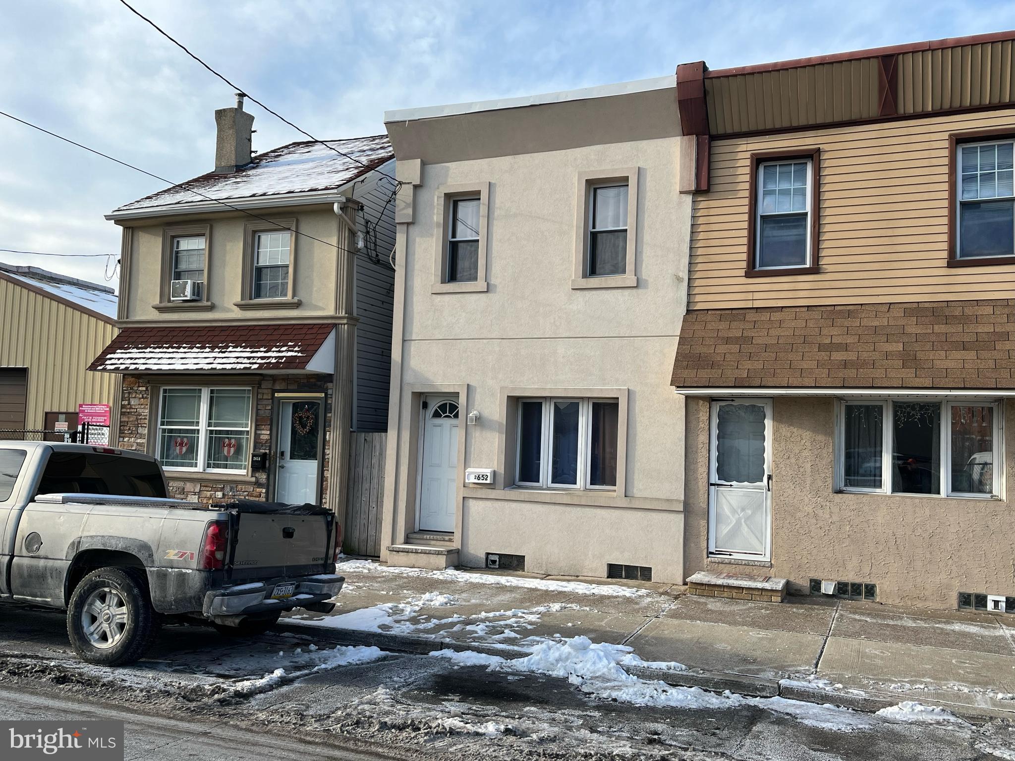 Renovated new in 2018 including kitchen and bath (2017-2018) 16' row. hardwood floors t/o. Basement laundry with washer & dryer. Wide street has lots of available parking 24 hrs a day. CENTRAL AIR. Fenced rear yard with patio.