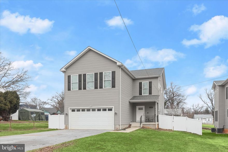 Your newer 4-bedroom, 3.5-bath home nestled in the Brighton community awaits. The open-concept main level features a modern neutral color palette and wood-inspired luxury vinyl plank flooring. The spacious living room offers a warm and inviting atmosphere with its stacked stone gas fireplace and views of the fenced rear lawn. Your culinary skills will shine in the gourmet eat-in kitchen, highlighted by stainless steel appliances, including a gas cooking range, 42-inch cabinetry, gleaming quartz countertops, and a classic subway tile backsplash. The adjoining dining area is perfect for both casual meals and festive gatherings. A main-level powder room and access to the two-car garage provide additional convenience.
On the upper level, the primary bedroom suite welcomes you with a double door entry, a soaring cathedral ceiling, plush carpeting, a walk-in closet, and an en suite bath that features a separate shower, tub, double sink vanity, and a linen closet for ample storage. Three additional bedrooms with walk-in closets, a full hall bath, and a well-placed laundry room complete this level.
The lower level adds even more living space with a generous recreation room and walkout stairs. A full bath makes this area ideal for entertaining, while the adjacent utility room offers abundant storage.
Built in 2019, the home provides the comfort and peace of mind that come with a well-kept newer build. Its prime location near I-83, I-695, the Reisterstown Plaza Metro Station, Foundry Row, and an abundance of shopping, dining, and recreational options makes every day effortless. This beautiful home is calling your name.