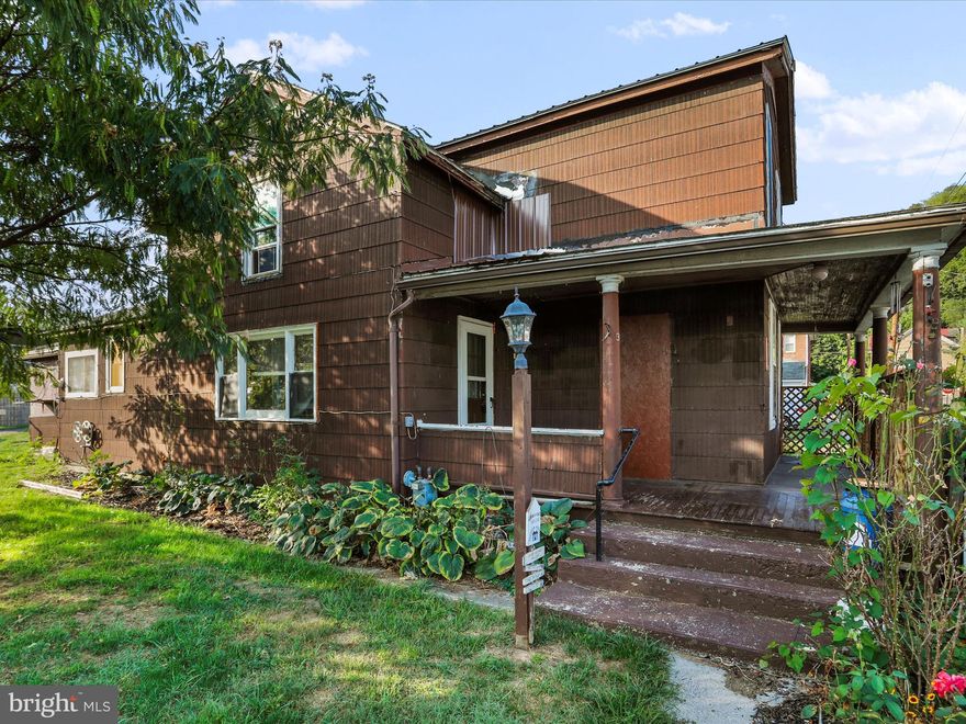 Opportunities galore!  Don't miss your chance to capture this gem of a property nestled in the heart of Keyser!  2 to 3 beds on the second floor, a HUGE fenced rear yard, and an awesome porch on the front to relax on!