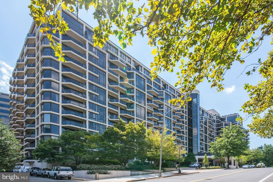 Lives like a Townhouse ---2 level 2BR/2BA w expansive Private Terrace, spacious LR/DR w stunning wood floors, renovated Kitchen w breakfast bar, dramatic floor-to-ceiling windows, exceptional closets & new washer/dryer! Located in a full-service bldg w Pool, Parking, Gym, Storage & 24-hour Desk....Walk to Georgetown, Metro! NOTE: Pls do not let cats out!