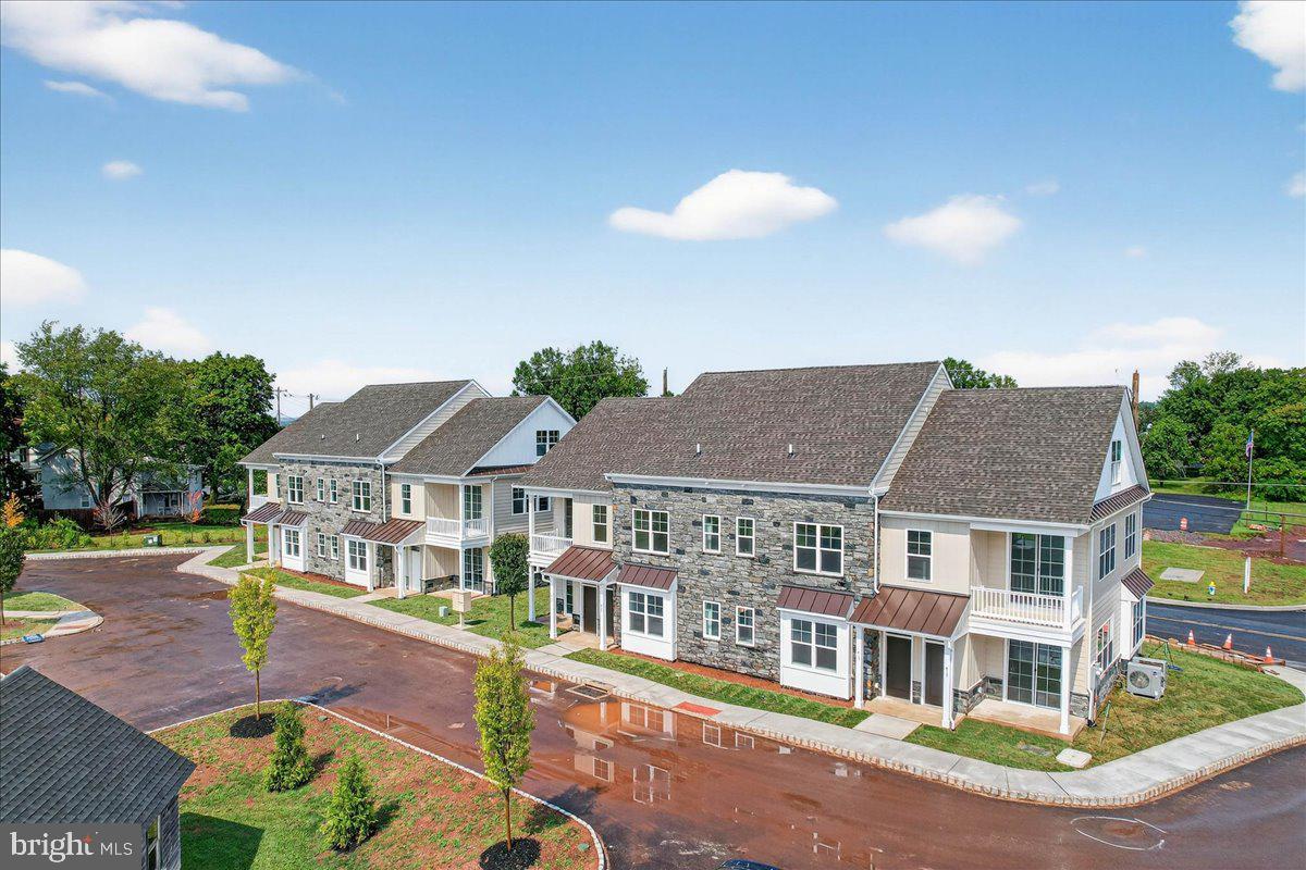 Quick Delivery New Construction Home Available, 3 bedroom/3 bath, 2 story townhome, is already for you!
Welcome to Lederach Village, Harleysville’s newest townhome community where timeless design meets modern luxury. This exclusive neighborhood offers the convenience of one floor living as well as two story designs. Thoughtfully crafted with open floor plans, elegant finishes, and an emphasis on comfortable living, Lederach Village offers so many choices to accommodate your lifestyle. .
Inside, you’ll find chef-inspired kitchens featuring quartz countertops, high-end cabinetry, designer fixtures, and a spacious center island that makes entertaining effortless and cooking a pleasure. The homes are enhanced with 7” plank engineered flooring, extensive woodwork, and trim packages that bring an added layer of sophistication.
Retreat to a private primary suite and the primary bathroom, with beautiful tile designs and extensive cabinetry, fixtures and lighting. While an additional bedroom and hall bath provide space for family, guests, or a home office. 3rd floor has a large, 3rd bedroom and 3rd full bathroom. Great space for family, or an at home office, gym or whatever suits your lifestyle. Every detail has been carefully designed with luxury and convenience in mind — making Lederach Village not just a place to live, but a place to truly call home.
Completely finished and ready for it's new owner, this home has a private balcony, open floor plan and is located in the heart of Harleysville. Convenient to all the eateries, shops, parks and golf courses minutes from your doorstep.
Looking for a home to move into now, be sure to visit and tour this amazing property at Lederach Village!
Looking to build and customize your own townhome, be sure to visit us and we can help you with that too.
*Professional Photos coming soon