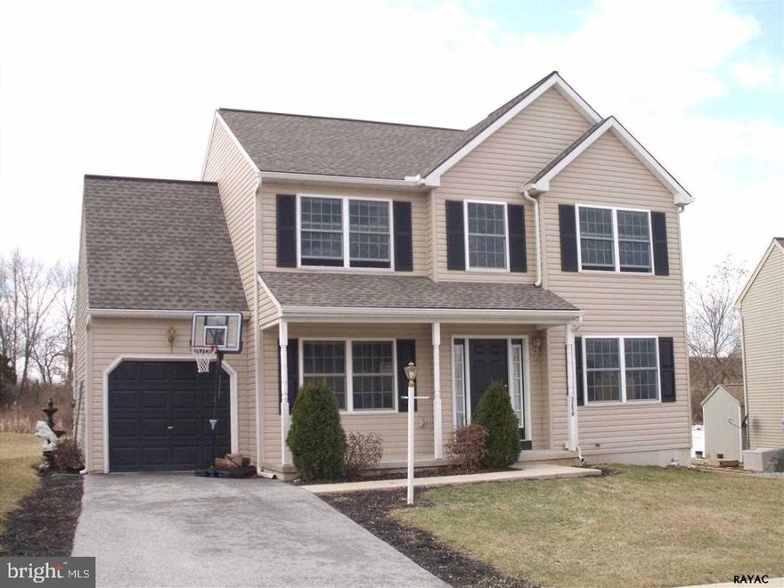 Great 1-owner, Colonial w/ extra features including side-light windows by front door, double-bowl vanity & garden tub, hdwd flrs, superior walls & rough-in bath in BSMT, daylight walk-out BSMT.  Large lot; no homes behind you.