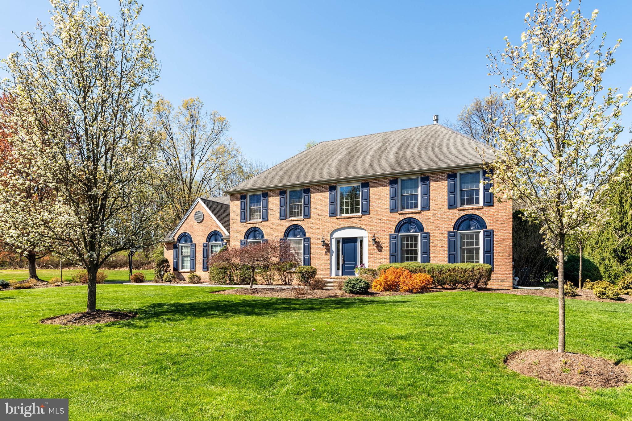 Step into timeless elegance at 30 Foxfield—an impeccably updated home in the prestigious Ridings of Whitpain. Set on a pristine .6-acre lot abutting preserved community open ground in a cul de sac. The home is surrounded by mature landscaping and situated on a level, flat lot, this Realen-built home is enhanced by a stunning addition that takes luxury and functionality to the next level.
The expanded footprint includes a show-stopping gourmet eat-in kitchen, mudroom entry with custom coat closet, walk-in pantry, and an oversized laundry room complete with granite folding station and farmhouse sink—every detail thoughtfully designed for elevated everyday living.
The heart of the home is the chef’s kitchen, designed by Blue Bell Kitchens and guaranteed to impress. This culinary masterpiece features a 6-burner Viking Professional range/oven with griddle, Sub-Zero refrigerator, Miele dishwasher, built-in Miele coffee station and Sub-Zero beverage drawers, and separate warming drawer. A richly layered and character-filled kitchen, featuring a mix of woods including inset, raised-panel mahogany cabinetry with beaded board and glass accents brings timeless beauty and thoughtful storage. Anchoring the space is an oversized granite topped center island (green painted cabinetry) with breakfast bar that adds a touch of personality and contrast, while custom black-painted cabinetry in the desk area offers a tailored workspace that blends function with flair. This stunning kitchen also includes a large eating area with a beautiful view of the backyard garden-perfect for entertaining a dozen or more family and friends. The thoughtful mix of materials and finishes creates a kitchen that feels both elevated and inviting. Porcelain tile flooring and ceramic backsplash and Lutron lighting complete the space. Two sliding doors open to the rear hardscaped patio—perfect for morning coffee or summer evenings under the stars.
The adjacent family room features a handsome stone fireplace, arched windows, and skylights that bathe the space in natural light. A first-floor office or playroom, spacious formal living room, and elegant dining room with deep crown moldings offer endless versatility. The grand two-story foyer welcomes with a solid wood door, fanlights, and abundant natural light. Beautiful hardwood floors and newer carpeting enhance the main level, which also includes a stylish powder room.
Upstairs, the primary suite is a sanctuary with a sitting area, walk-in closet plus three additional closets, and a luxurious en suite bath featuring a frameless glass shower, soaking tub, quartz topped double vanity, and private toilet room. Three additional bedrooms are generously sized and feature closet organizers. The hall bath includes a double sink vanity with granite countertops.
The finished lower level offers multiple flex zones for recreation, fitness, or media, along with a full bath, mini bar area, and two large storage rooms.
Additional highlights include: 3-car oversized garage, 2-zone HVAC system, Generac whole-house generator, Located in sought-after Whitpain Township/Wissahickon School District, Shady Grove Elementary School, Minutes to downtown Chestnut Hill, Ambler, Springhouse, and Blue Bell for top-tier shopping and dining. Close to all major transportation routes (Rt. 309, Rt. 476/Blue Route, Rt. 276/PA Turnpike) and close to King of Prussia, Center City, major universities and hospitals. Home is 4341SF above grade with additional finished space + storage areas in basement with bulkhead door access/egress.