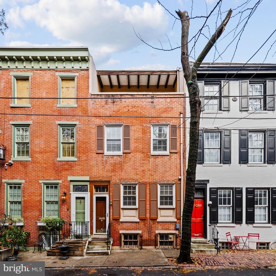 Welcome to this lovely home on one of the desired blocks in Rittenhouse Square - Addison Street. This beautifully renovated home offers a perfect blend of modern amenities and classic charm.  The newly renovated kitchen is a foodie's dream, boasting sleek cabinetry, high-end appliances, and ample counter space for meal preparation. The open layout creates an ideal space for entertaining guests or simply enjoying everyday living, and on those chilly evenings, the wood-burning fireplace adds an extra touch of coziness to the living space.  The spacious main bedroom features a vaulted ceiling, en-suite full bathroom, and sliding glass door to a private balcony.  Outside, the convenience of a dedicated parking space awaits, providing a rare perk in this bustling urban setting.  Additionally, the home is located on Addison Street, known for its picturesque charm that has made it a favorite spot for wedding photos and festive holiday displays, including festive Christmas lights.  Located in the coveted Rittenhouse Square neighborhood, this home offers unparalleled access to an array of shopping, dining, and cultural experiences. With a plethora of renowned restaurants, trendy boutiques, and art galleries just moments away, you will find yourself immersed in the vibrant energy of city living.
