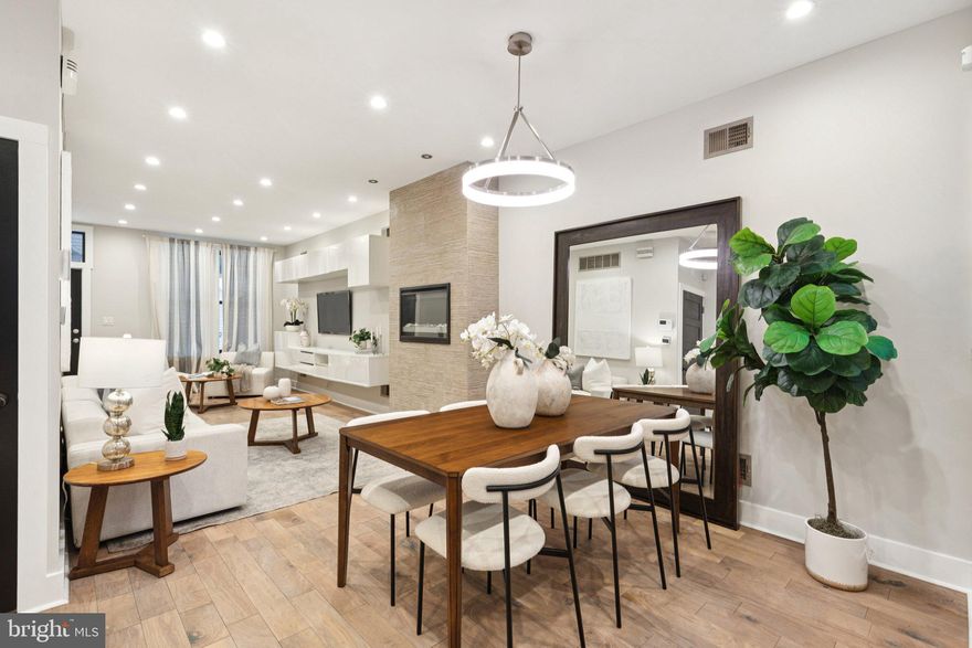 Introducing 1534 N. Natrona Street! This fully-renovated home impresses immediately with modern styling, entertainment cabinetry, and one of the largest kitchens available on the market. Hardwood floors on first and second level. Ample room for dining and entertaining. Upstairs, two oversized bedrooms are complemented by two full bathrooms -- elevated ceiling height makes it feel even bigger. Even more impressive basement with den perfect for fitness or entertainment room. Rear basement bedroom and full bath for privacy. Convenient to I-76, Center City Philadelphia, and around the corner from Fairmount Park. Schedule your private showing today!