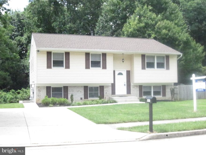 Just Remodeled, 4 Bedrooms and 2.5 Bathrooms, Stainless Steel Appliances and Granite Tops, Hardwood Flooring, Washer and Dryer, Central Air with Gas Heat and Hot Water, Upper Level Sliding Glass Doors to Large Deck and Rear Lower Level Sliding Glass Doors to Large and Level Backyard, Excellent Baltimore County School System, Convenient to Shopping and Employment in Well Established Neighborhood