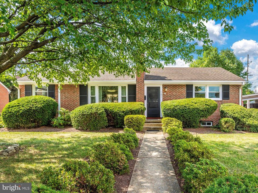 OFFER DEADLINE - Monday July 22 at noon.  Check out the 3D Tour... Scroll through the Virtual Tour to the last page for the link.    This very special home is located in a delightful neighborhood less than 400 feet from the iconic Baker Park that is located in the heart of Historic Frederick City.    Enter and enjoy the many updates:   the kitchen and living room are open to one another, and the lovely stone fireplace can be seen throughout the main level .    The main level bedroom #3 has a private location away from the other two bedrooms and includes a closet.  The kitchen features an island and  very pretty solid wood cherry cabinets.    Three comfortable bedrooms complete the main level.  The very pretty Acacia Hardwood floors are throughout the primary living area.  This flooring is applauded for its hardness level and durability!    The lower level is completely finished with a 4th bedroom that has an egress window and closet!     Besides the nearby Baker Park, the backyard has a park-like feel too!  From the flagstone patio, enter through the arch to your private park with lovely landscaping and privacy fence.,   The lovely phlox (see owner's pictures) will welcome spring as it cascades over the stone wall.   The Maple tree  offers dappled sunlight as you stroll the backyard and relax with morning or evening beverages!    This property also features a one car detached garage and shed for storage.      The heating system is the warm and desirable hot water baseboard with central air too!    The Gas Line is stubbed to the house for anyone that would prefer a different heating fuel or perhaps add gas logs to the fireplace and for gas cooking.   The meter is waiting to complete the installation by the next owner of this wonderful property.  Energy efficient windows are installed throughout the property too!  For anyone that desires the location but more square footage, several homes on Fairview have added a second level addition!