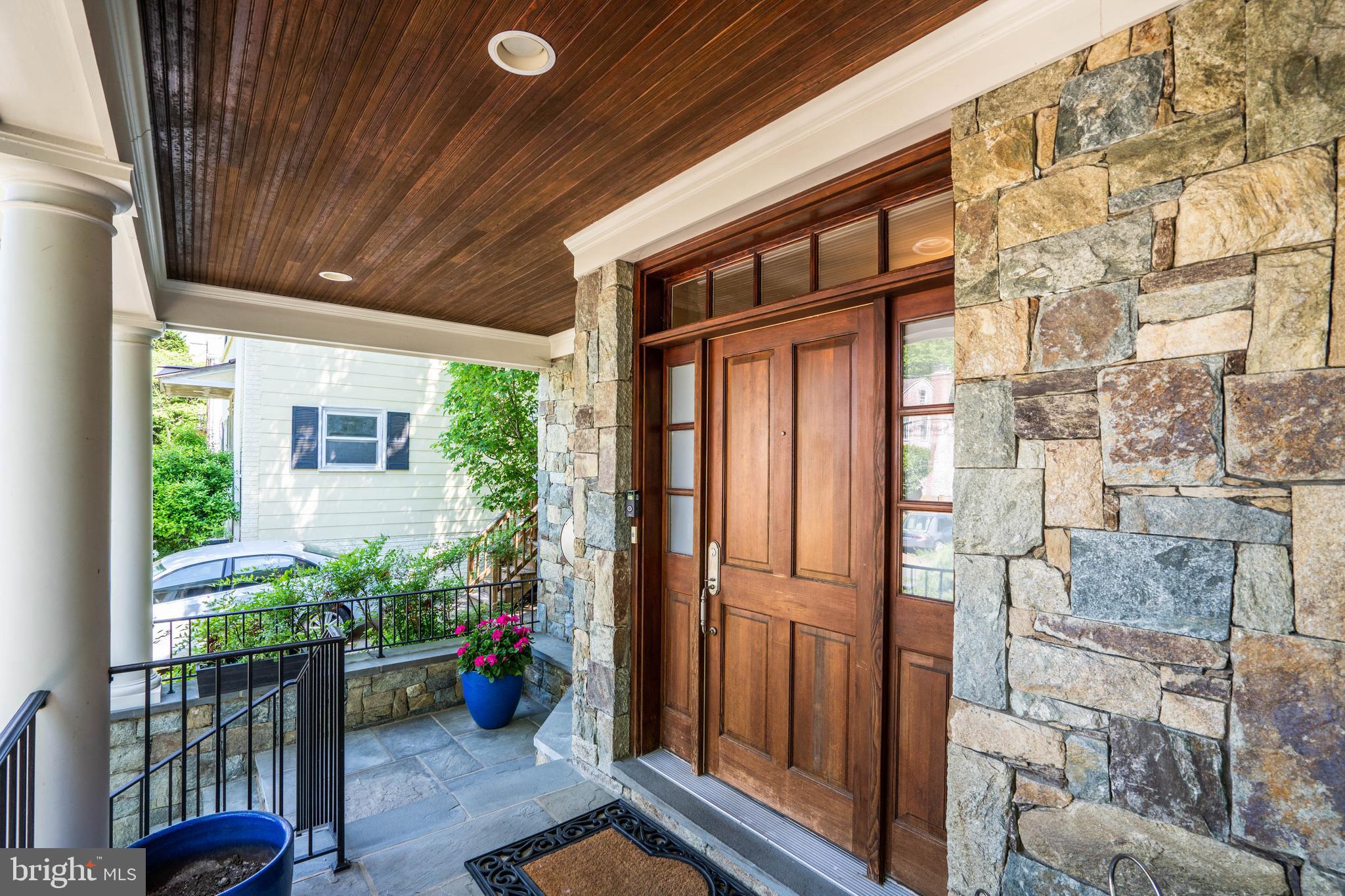 Beautifully sited in the heart of the desirable Brookdale neighborhood, this spacious, updated home is just blocks to vibrant Friendship Heights. Renovated with custom finishes throughout, this six-bedroom five-and-one-half bath home boasts an eat-in, state-of-the-art kitchen complete with center island, stainless steel appliances, and a Butler’s pantry for ample storage. The stunning kitchen overlooks a sun-filled family room with gas fireplace and French doors opening to a private patio and lush grounds. A lovely living room with gas fireplace and a separate dining room each feature beautiful crown moldings. The cozy study and a powder room complete the first floor of this home. The second floor features an owner’s suite with a walk-in closet and spacious bath with dual vanities and a soaking tub. Second floor laundry, as well as three other delightful bedrooms and two full baths can be found on this level. A fifth bedroom with full bath enjoys privacy on the third floor, and the sixth bedroom and full bath can be found on the lower level. The lower level rec room, complete with hardwood floors and recessed lighting, has a mudroom area leading to a two-car garage. The Brookdale neighborhood feeds into the Westbrook, Westland and B-CC schools, and is close to Spring Valley, Tenleytown, Capital Crescent Trail, parks, Metro, shops, and restaurants of Friendship Heights and Spring Valley.