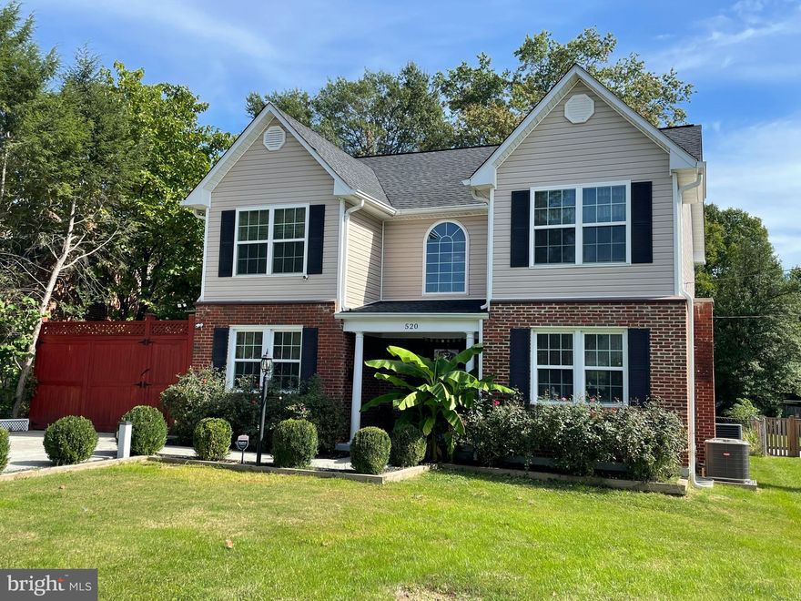 A Classic Presence with Modern Versatility in Sought-After Villa Estates. Set on a beautifully landscaped near-quarter-acre lot, this thoughtfully updated 1953 neocolonial blends timeless design with contemporary comfort. Extensively renovated in 2018, the home offers over 3,000 square feet of flexible living space across three finished levels—ideal for multigenerational living, remote work, investment potential, or simply room to spread out. With seven bedrooms and four full baths, the layout easily adapts to a variety of lifestyles. The traditional brick façade, mature trees, and gated driveway provide privacy and strong curb appeal. Inside, the main-level foyer opens to two spacious bedrooms and a full bath—perfect for guests, a home office, or a private suite. At the heart of the home, the open-concept eat-in kitchen features stainless steel appliances, double wall ovens, granite countertops, a large island, and generous pantry storage—making everyday meals and entertaining effortless. A unique bonus is the enclosed porch, reimagined as a second full kitchen with marble flooring, wall-mounted A/C, and a high-capacity exhaust fan—perfect for culinary enthusiasts, special gatherings, or seasonal use. Upstairs, you'll find three well-sized bedrooms and two full baths, including a serene primary suite with a walk-in closet and spa-style ensuite: a jetted tub, a glass walk-in shower, and a double vanity. Solid wood floors unify the upper and main levels with warmth and elegance. The lower level offers true independence, featuring a private entrance, two bedrooms, a full kitchen, laundry, a spacious living/dining area, and ample storage—ideal for extended family, guests, or rental income. Step outside to a new 12' x 14' deck overlooking a fully fenced yard—perfect for entertaining, gardening, or play. A 14' x 20' shed with full electrical service adds exceptional storage or workshop potential, and rainwater-harvesting garden beds are a bonus for green thumbs. Additional features include window treatments throughout, a ready-to-activate security system, and a 1-year home warranty for peace of mind. Located in Villa Estates, a quiet, tree-lined neighborhood with sidewalks and parks, the home is just minutes from downtown Frederick while offering a retreat from congestion. Enjoy easy access to US-15 and I-70, connecting you quickly to DC, Baltimore, and Northern Virginia. Experience space, comfort, and character—schedule your showing today.