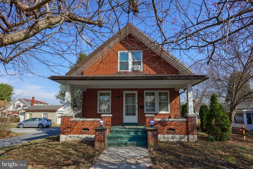 Welcome to this charming brick Cape Cod-style home, where timeless character meets modern updates. As you approach the property, you’ll be greeted by a large, inviting front porch, perfect for relaxing and enjoying the peaceful surroundings. The stunning metal roof not only enhances the home’s curb appeal but also provides durability and long-lasting protection.

Inside, the heart of the home is the remodeled kitchen, a true cook’s dream. With custom cabinetry and high-end countertops, this space is designed for both functionality and style. Whether you're preparing a family meal or hosting friends, you'll appreciate the attention to detail in this beautiful kitchen.

The second floor boasts three private bedrooms, each offering comfort and privacy. The remodeled bathroom on this level provides a modern touch while maintaining the home's classic charm. One of the bedrooms is currently being used as a walk-in closet, but the custom closets are removable, allowing the next owner the option to convert it back into a functional bedroom.

Outside, the right-sized yard offers a perfect balance of space and tranquility, situated on a quiet street that enhances the home’s peaceful ambiance. This lovely home is a perfect blend of classic style and thoughtful updates—an ideal setting for creating lasting memories. Don't miss the opportunity to make it yours!