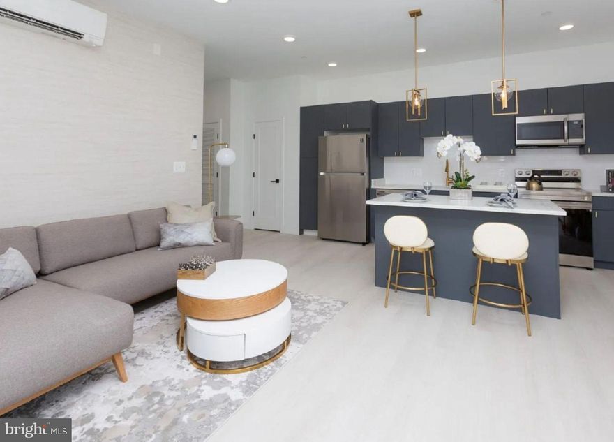 Five Hundred Dollars Off Your First Month of Rent!

Discover your ideal apartment in The Caroline, where luxury living meets historic charm in the heart of Fells Point. Nestled in this picturesque neighborhood, our stunning apartments offer a refined living experience.

Built in 2021, these new apartments step into open floor plans with soaring ceilings, creating an airy, welcoming ambiance that's flooded with natural light. Your gourmet kitchen, adorned with sleek stainless steel appliances and black matte hardware, will inspire your inner chef. The custom walk-in closets, quartz countertops, engineered hardwood flooring, Philip Jeffries wallpaper, and posh lighting add more than a touch of opulence to your everyday routine as shown in the model home photos.

Welcome to Fells Point, where charming cobblestone streets meet the waterfront. This pedestrian-friendly neighborhood boasts an array of bars, top-rated restaurants, and boutique stores. It's also home to one of Baltimore's most luxurious hotels, The Pendry. Explore historic streets, savor a lively culinary scene, and immerse yourself in the rich history and vibrant culture of this unique Baltimore neighborhood.
Your oasis at The Caroline awaits, and we are ready to help you find your dream apartment!