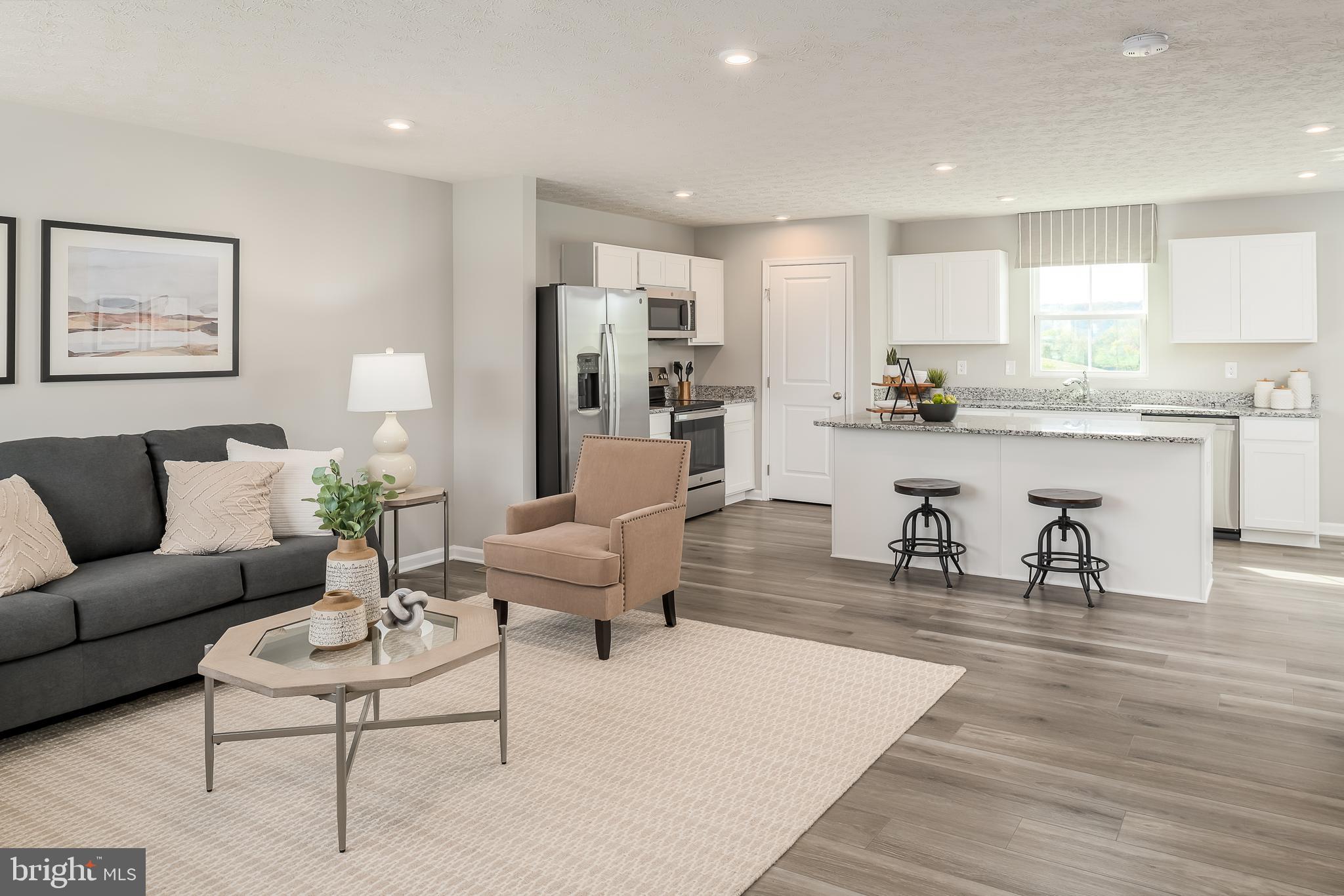 Enjoy the TO BE BUILT ELDER at CARDINAL POINTE! Enjoy the included new home warranty, spacious backyards, included kitchen appliances, included washer and dryer, and closing cost assistance with the use of seller's preferred lender! The Elder has it all! Step inside this spacious, 2-car garage, 4 bedroom, 2.5 bathroom single-family home. Walk into your open concept main level where you will see a sprawling great room that adjoins a gourmet kitchen with walk-in pantry, ample cabinets, and an oversized island that overlooks the dining area. A versatile flex room and powder room sits off of your garage entry that is ideal for a home office, hobby area or play space. Upstairs features three extra bedrooms, two of which with walk-in closets, an extra bathroom, your laundry room complete with an included washer/dryer, a loft, and the owner's suite oasis. The upstairs loft is perfect for extra entertaining space, or turn that space into a 5th bedroom! Inside your owner’s suite, you’ll find a luxurious dual-vanity bath and TWO walk-in closets!
Explore Cardinal Pointe Today - Spring Mills school district, 1 mile off I-81, and less than 20 minutes from Hagerstown. Closing Assistance Available with Use of Sellers Preferred Lender. Lot premiums may apply. Other floorplans and homesites are available. Photos are representative. Come and visit the model at: 181 Sanctuary Drive, Hedgesville, WV 25427