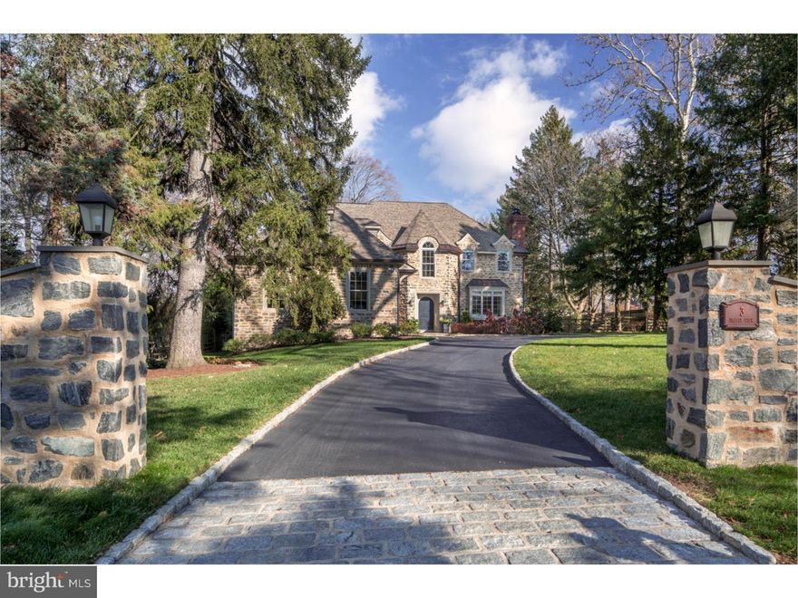 Imagine a home that looks like it's been there for years, but has the open floor plan desired by buyers today-this is IT! This exquisite Chestnut Hill home employs the quality of old world construction methods using Wissahickon Schist stone and brick fireplace chimneys. Built just seven years ago, this French Country home interior spirals around the classic kitchen with inset beaded doors, Carrara marble counters, a Viking 6 burner commercial cooktop and appliances, dramatized with a coffered ceiling. Entertain on the large flagstone patio, highlighted with a cocktail swimming pool, surrounded by a large fenced in yard.  Set off in a private location, the mahogany paneled office features a custom wall of built-ins designed for the most demanding professional.  The family room with barn dash fireplace mantle brings in additional daylight through a striking cupola ceiling.  A generously sized wood staircase and back stair case lead to the second floor.  The master bedroom features the requisite his and her walk in closets. Cocoon in the luxury bathtub in the soothing spa like master bathroom. There is also a pretty in violet princess suite and third and fourth bedrooms share a full bath; second floor laundry. A third floor private suite awaits guests and features a large bedroom with full bath. The walk up finished basement includes a Eurocave wine room, workout room and full bath.  Abundant storage can be found both in the basement and above the oversized two car garage that steps into a bead board finished mudroom hallway.   Don't miss this finely crafted turnkey home built with the highest level of quality and details complete with home generator, central vac, air and water purifier, and irrigation system; all hardwood floors throughout first-third floors.  Walking distance to "the Hill", Wissahickon Valley Park and train station.